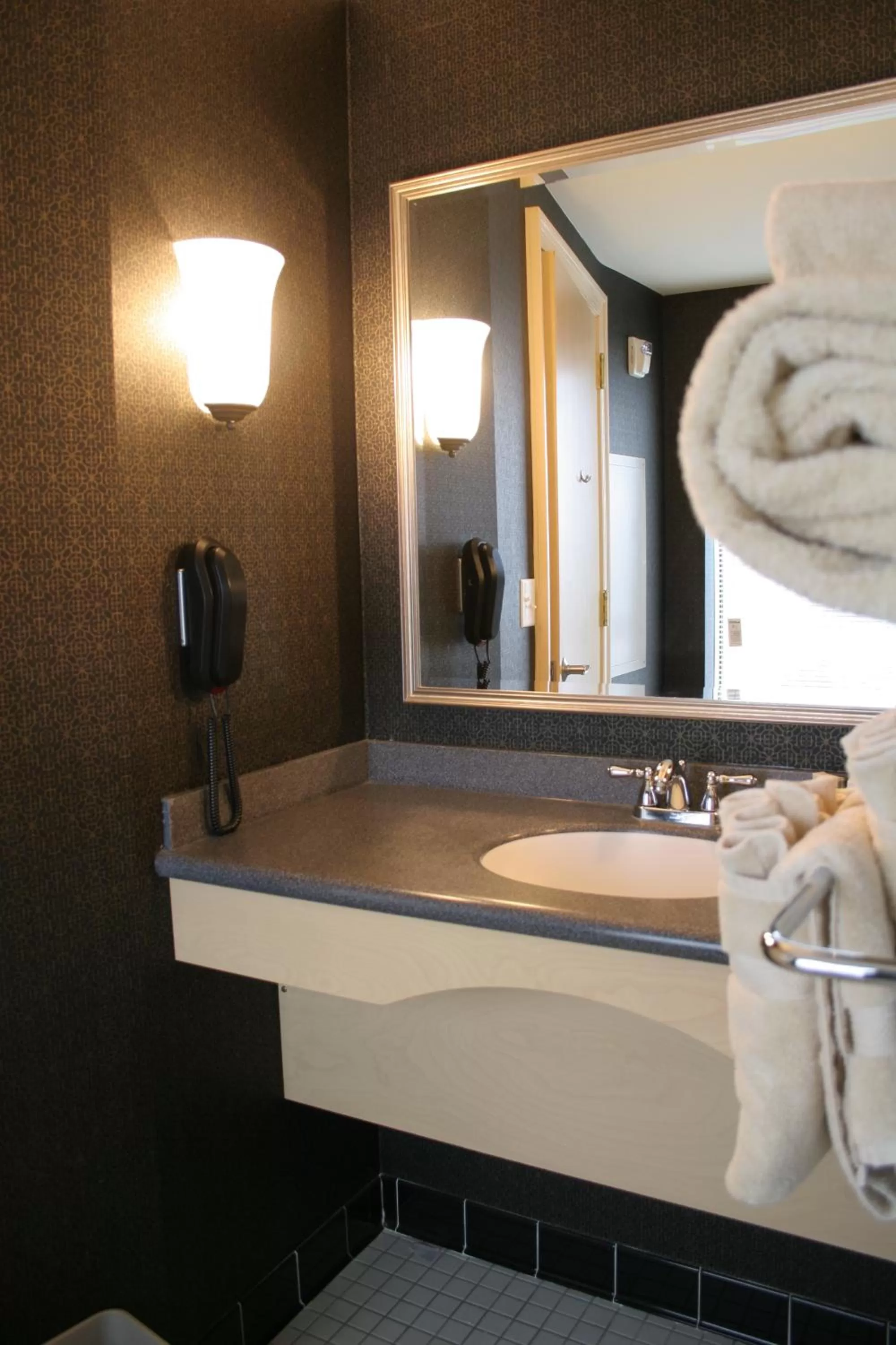 Bathroom in Ambassador Hotel Milwaukee, Trademark Collection by Wyndham