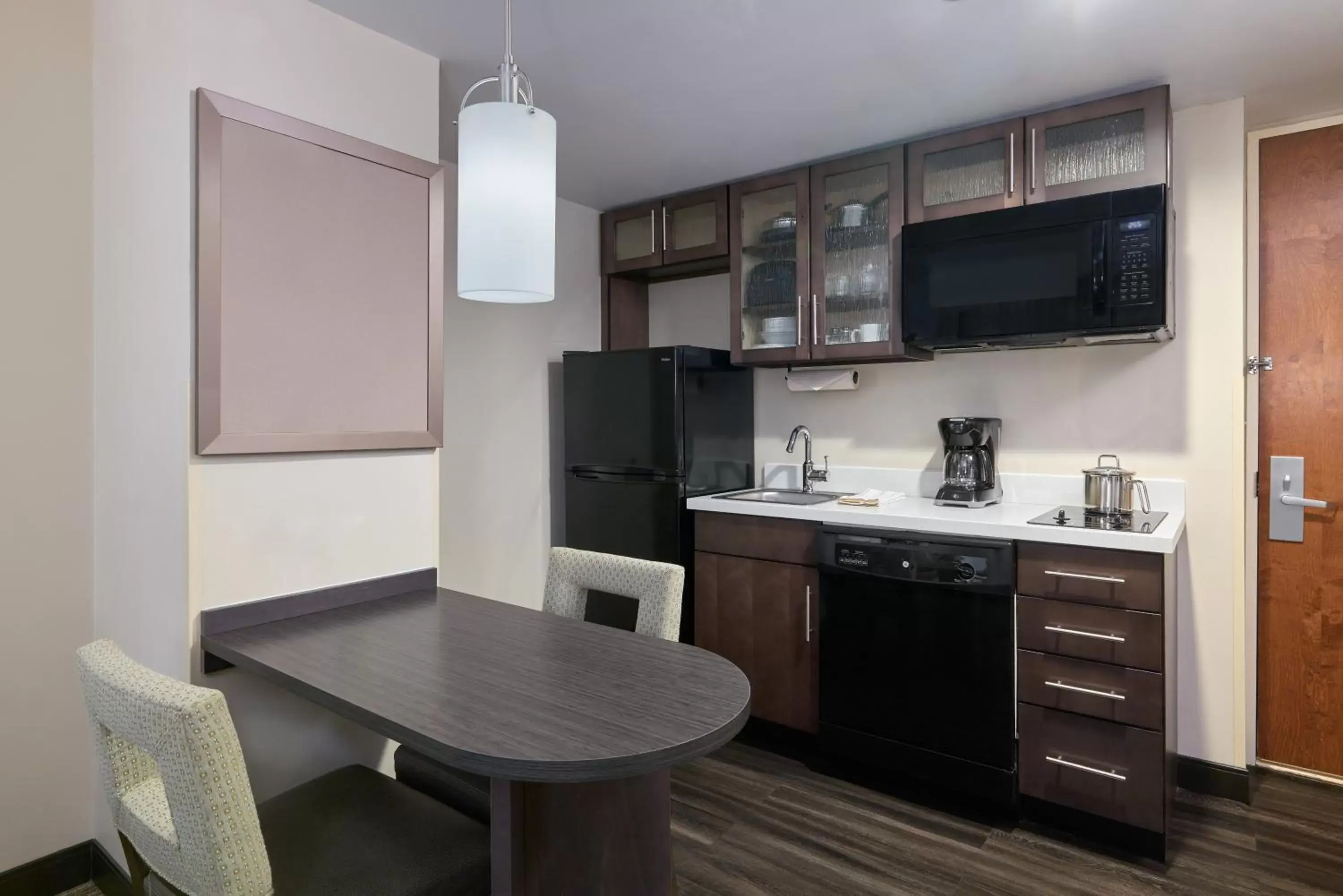 Kitchen or kitchenette, Kitchen/Kitchenette in Candlewood Suites NYC -Times Square, an IHG Hotel