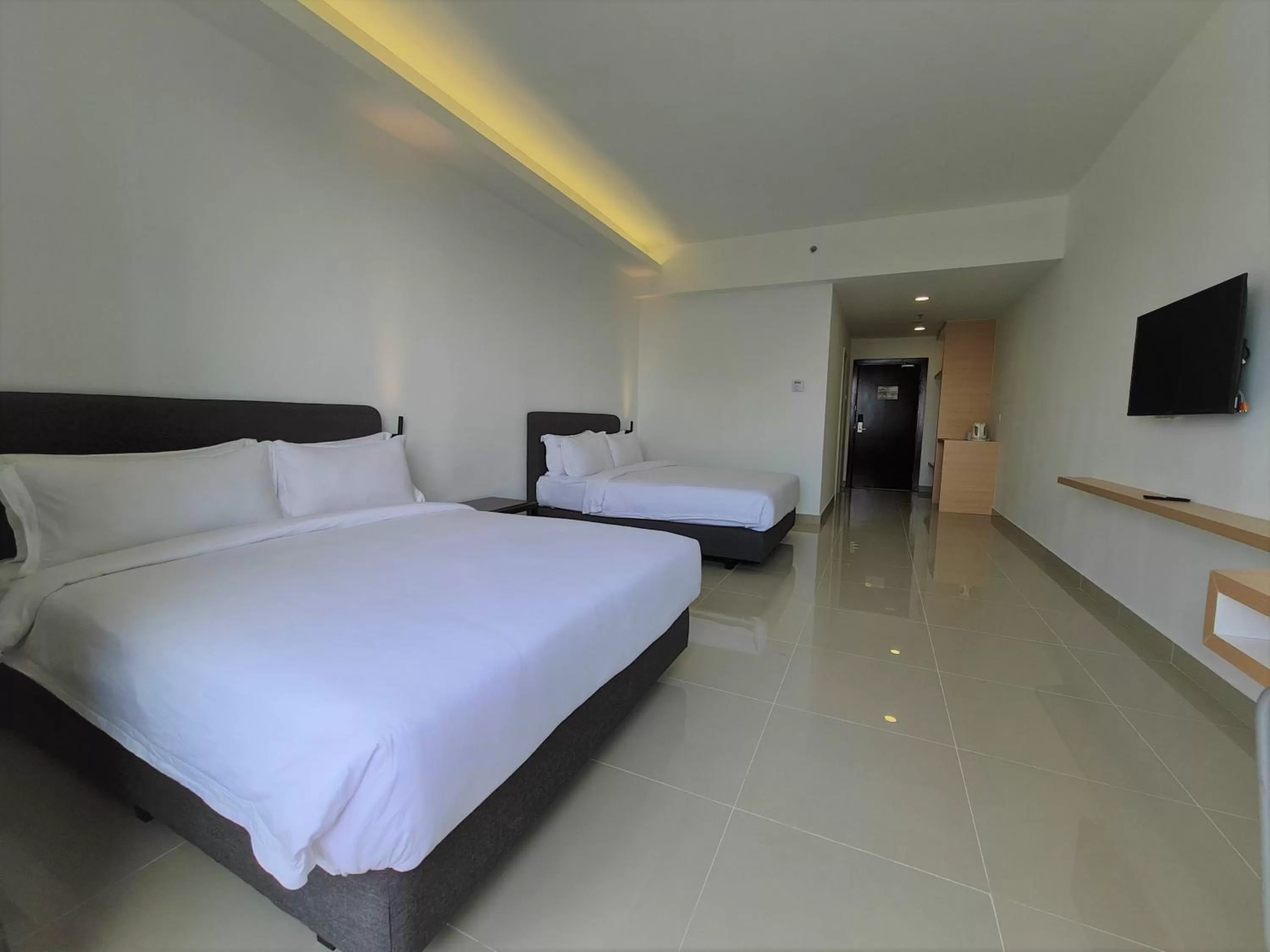 Bed in Swan Garden Resort Hotel