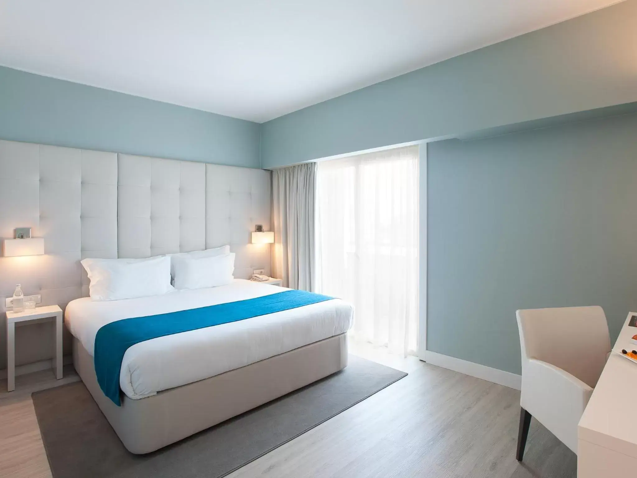 Bed in Lutecia Smart Design Hotel