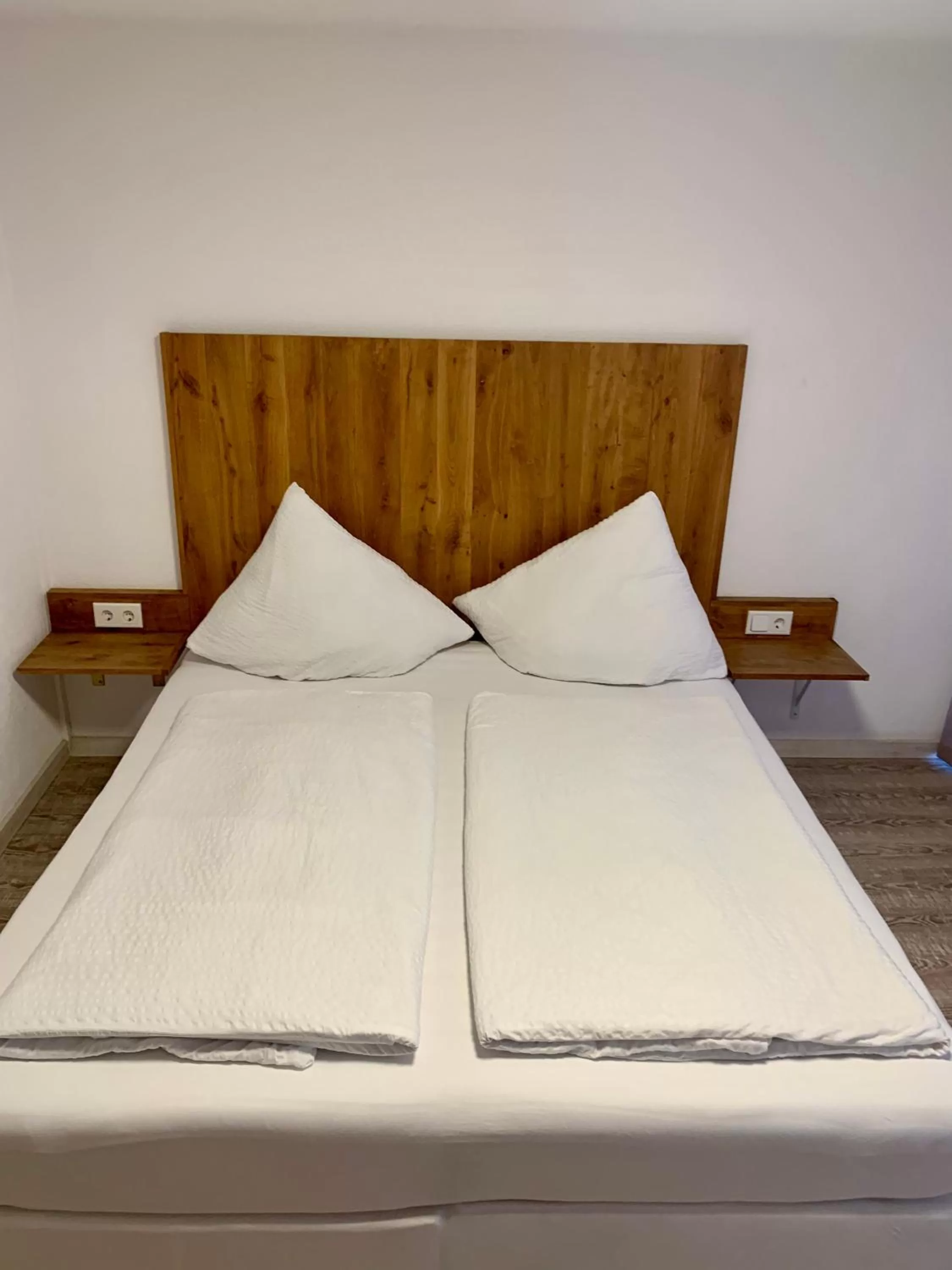 Bed in Smart Stay Rooms Feldkirch