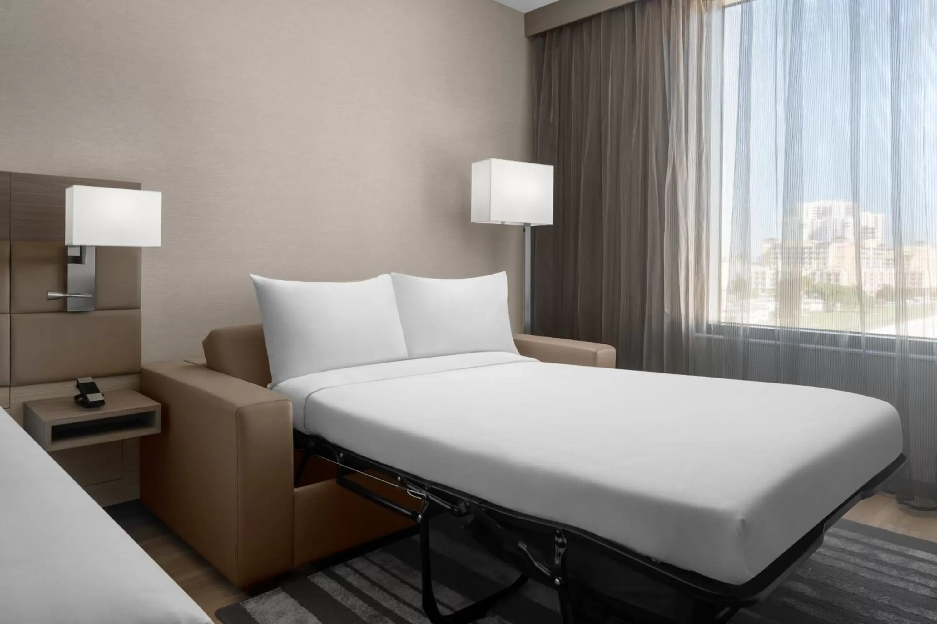 Bed in AC Hotel by Marriott Miami Dadeland