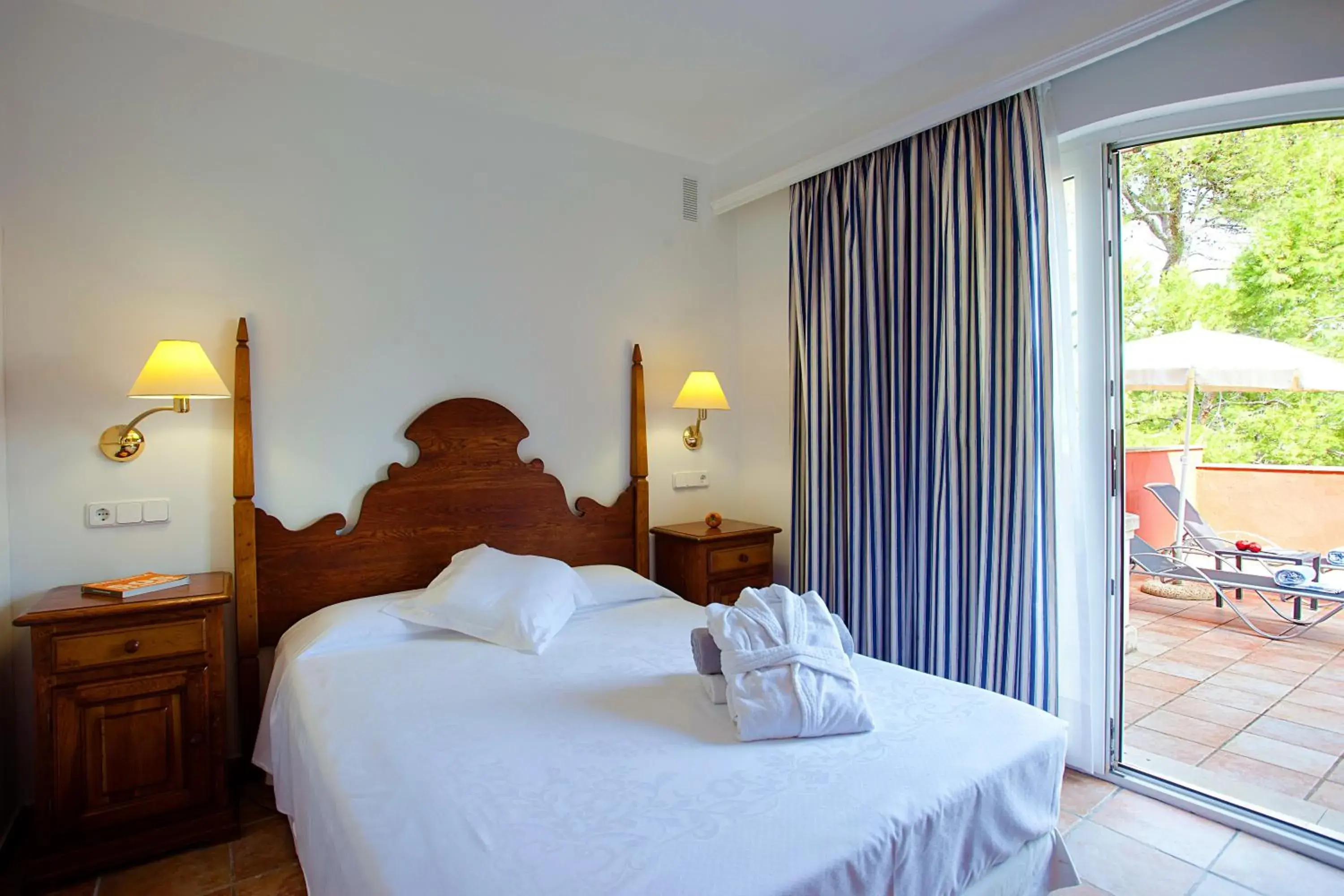 Photo of the whole room, Bed in Hotel Cala Sant Vicenc - Adults Only