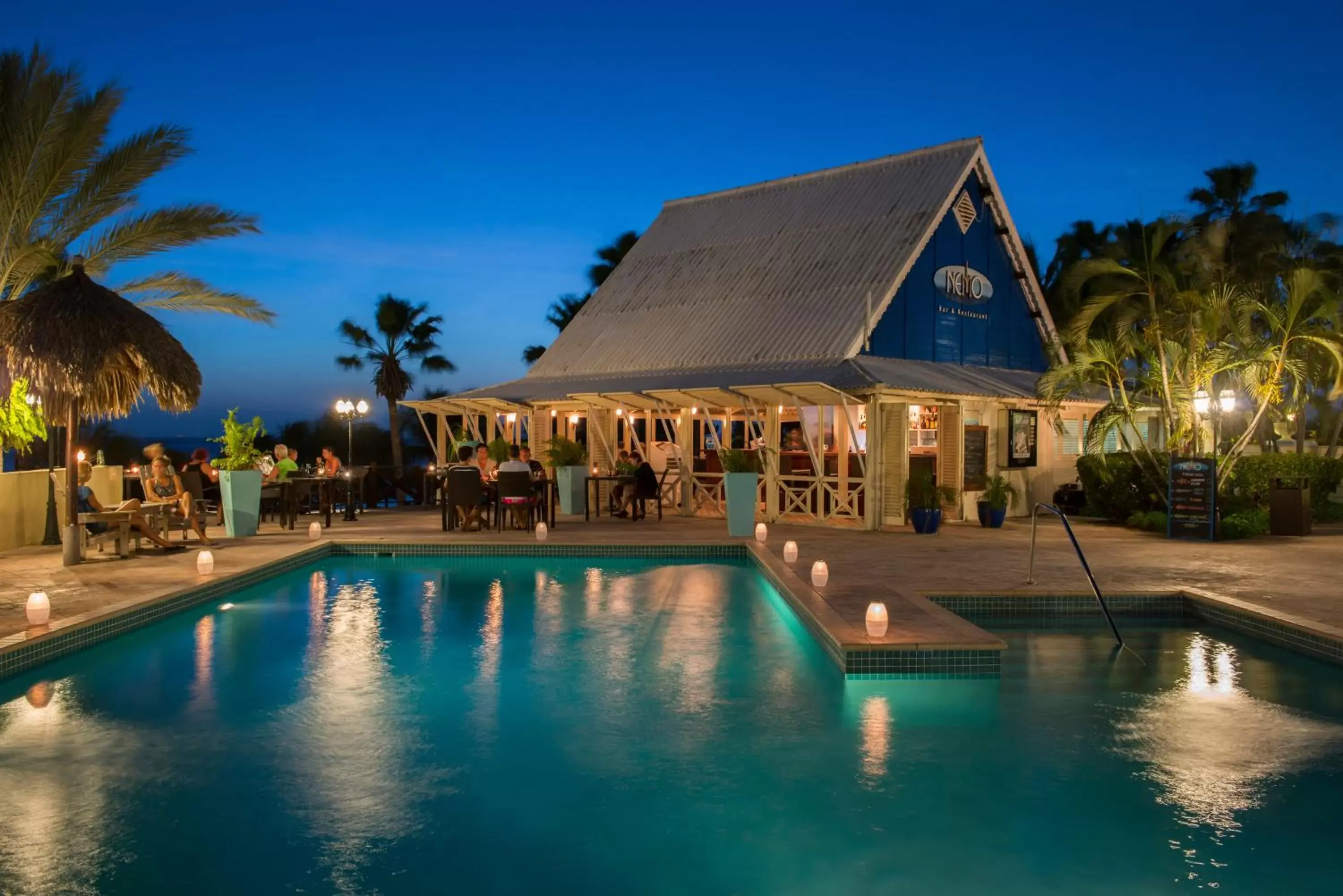 Facade/entrance, Swimming Pool in LionsDive Beach Resort