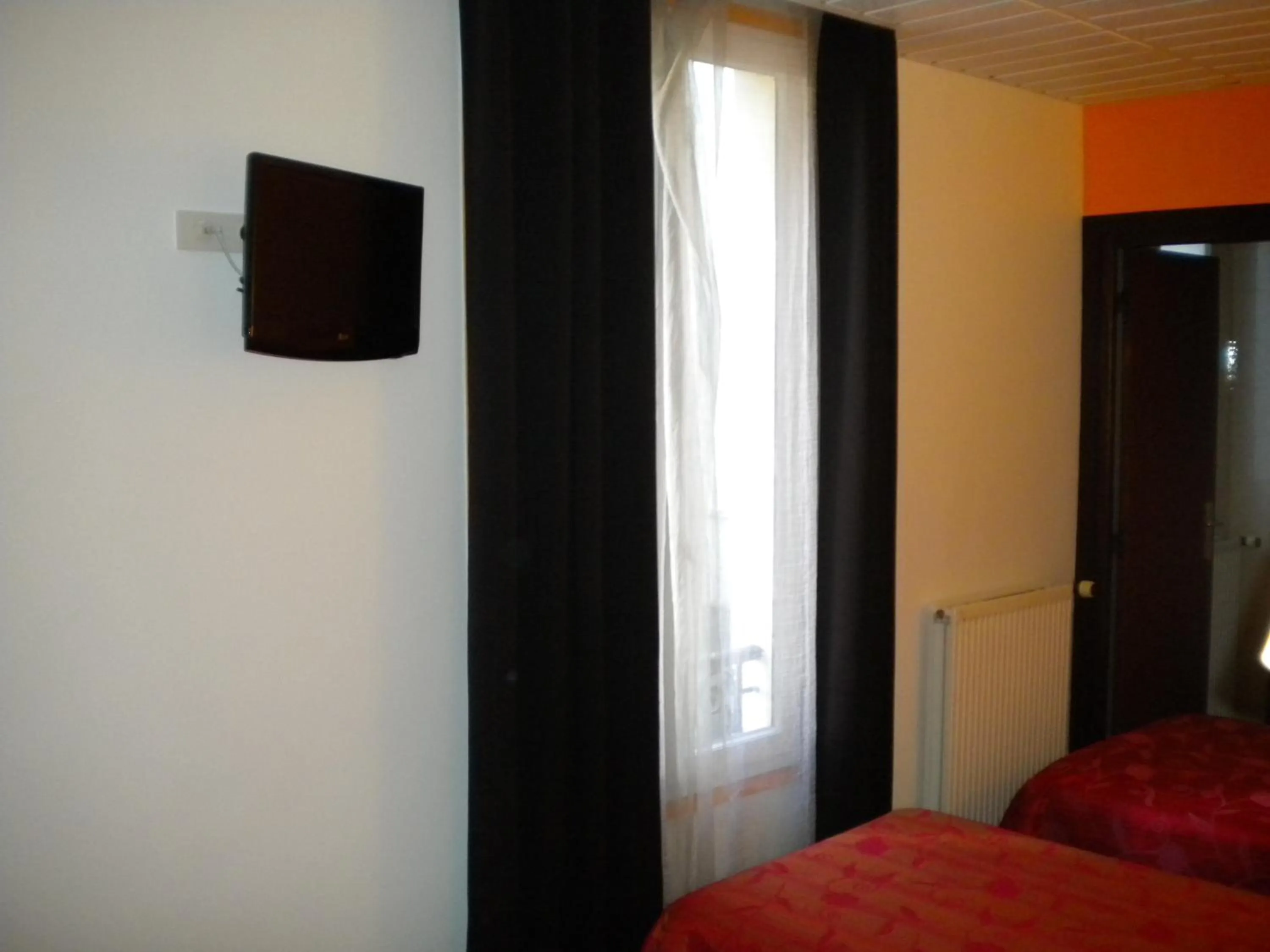 TV and multimedia, Bed in Hotel De La Place