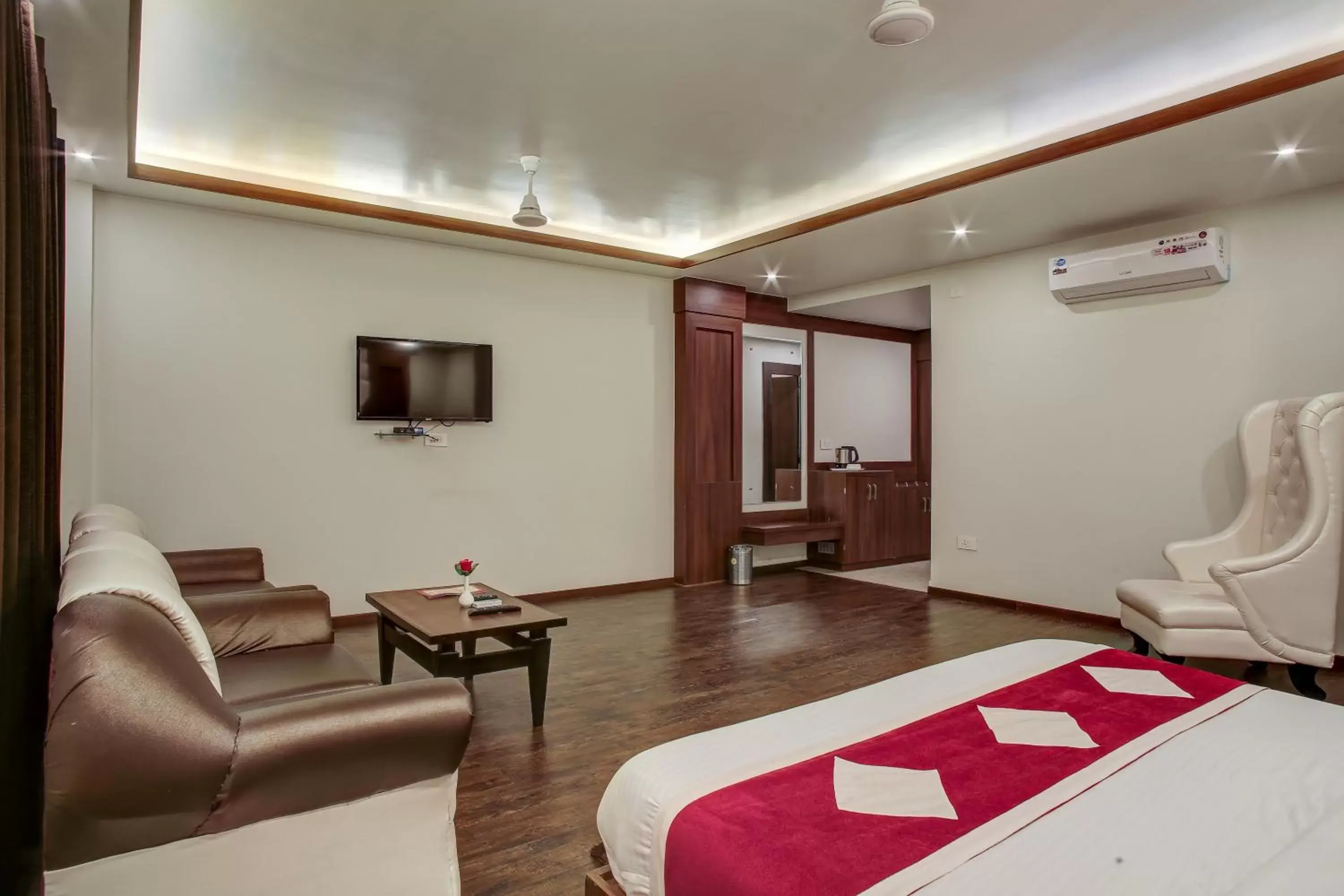 Bedroom, Seating Area in Hotel The Royal Krishna