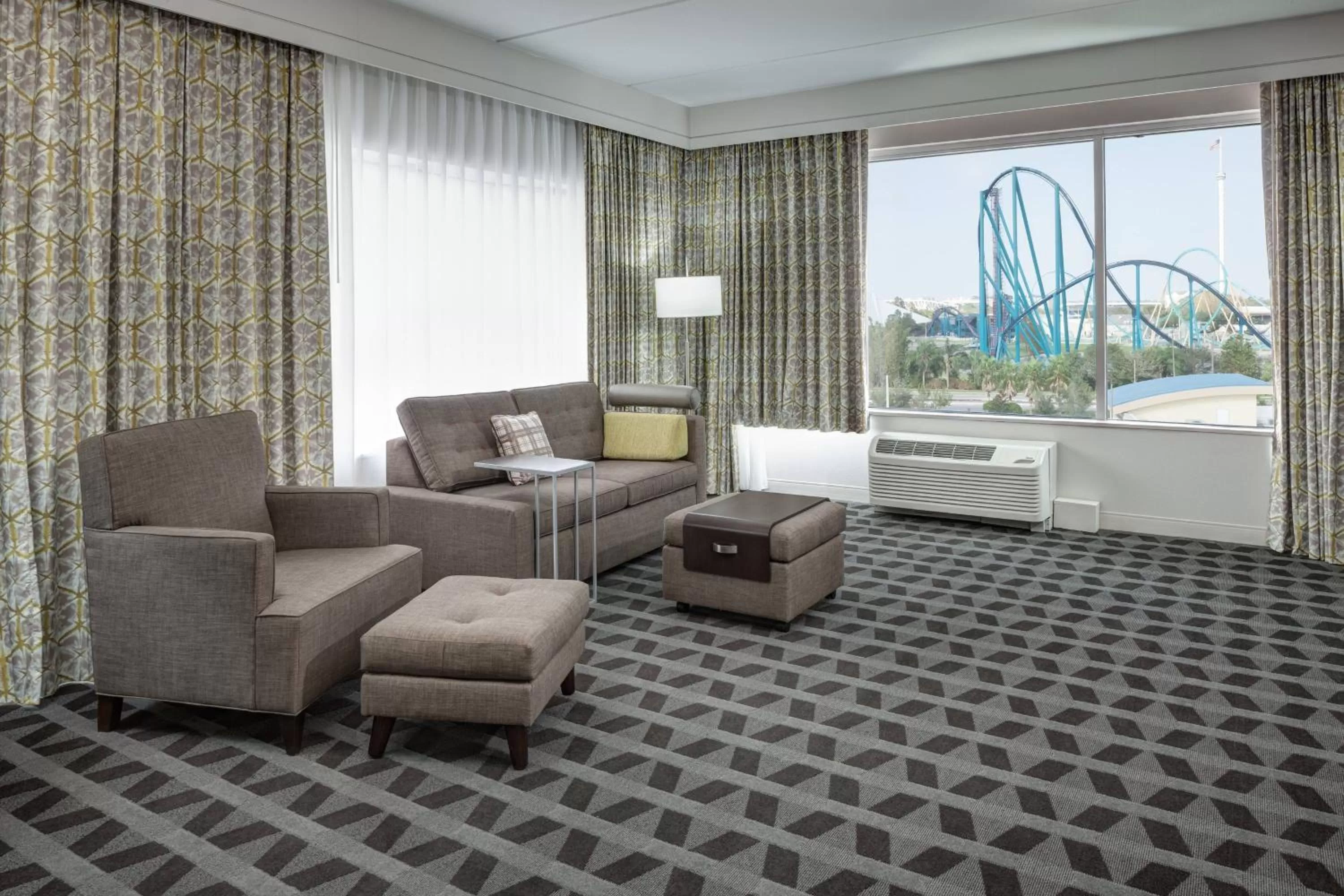 Living room in TownePlace Suites by Marriott Orlando at SeaWorld