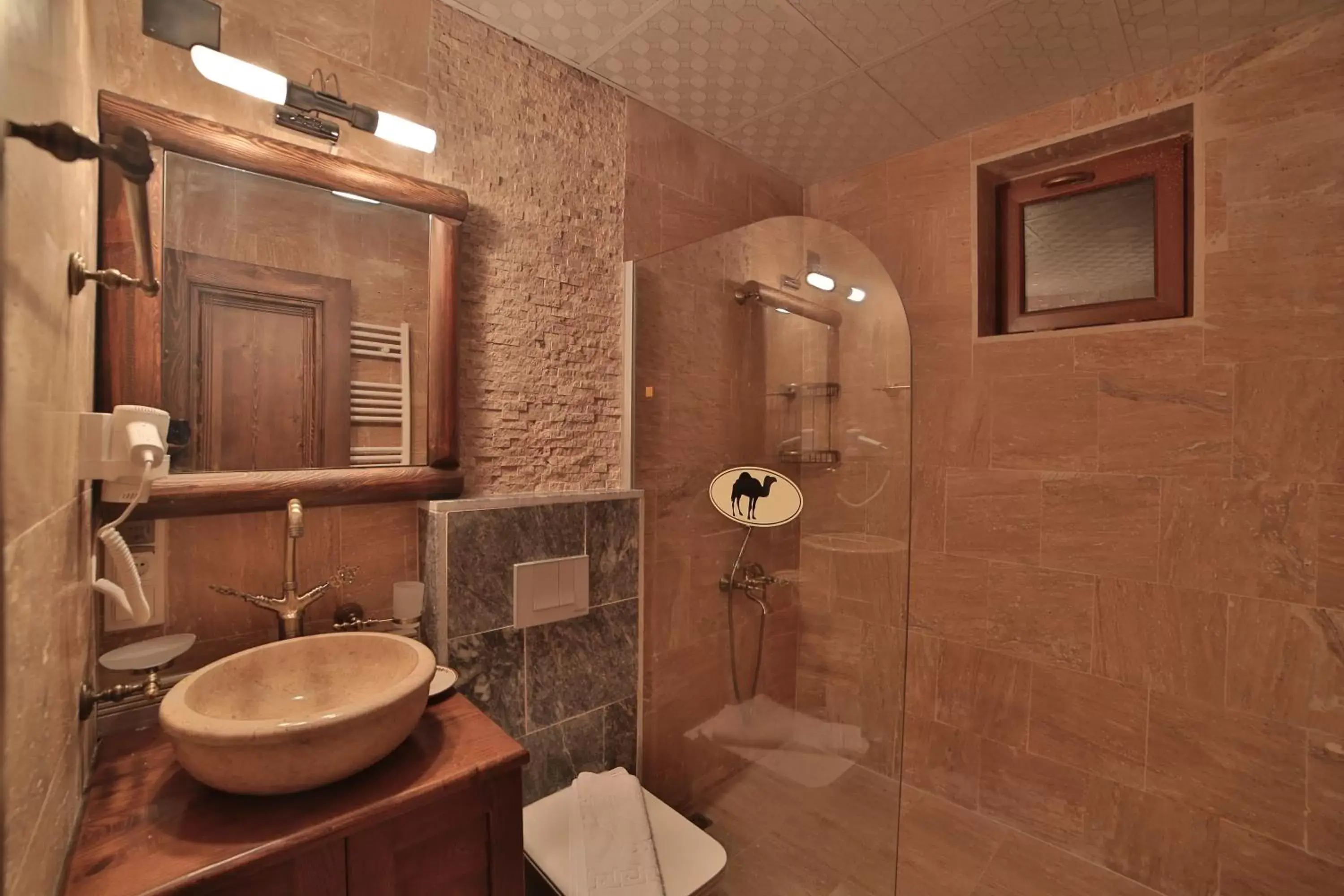 Shower, Bathroom in Caravanserai Inn Hotel