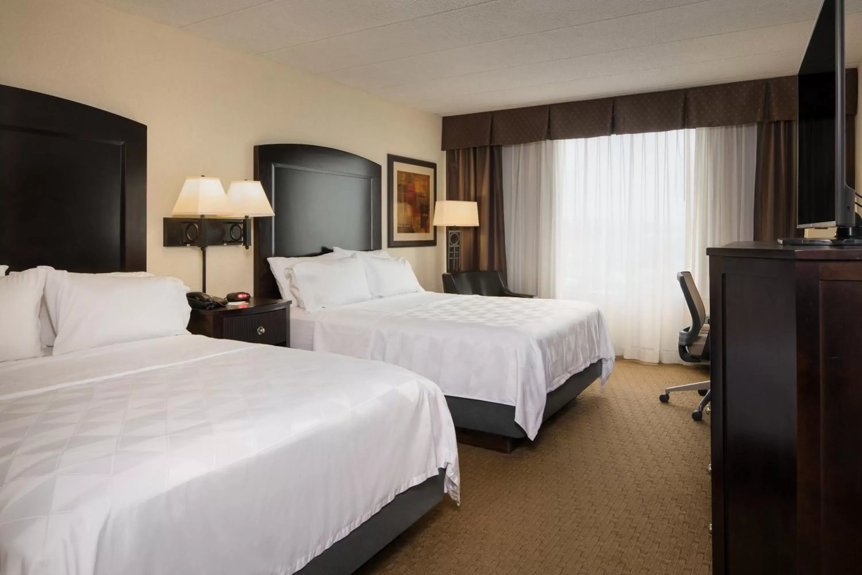 Photo of the whole room, Bed in Holiday Inn and Suites Charleston West, an IHG Hotel