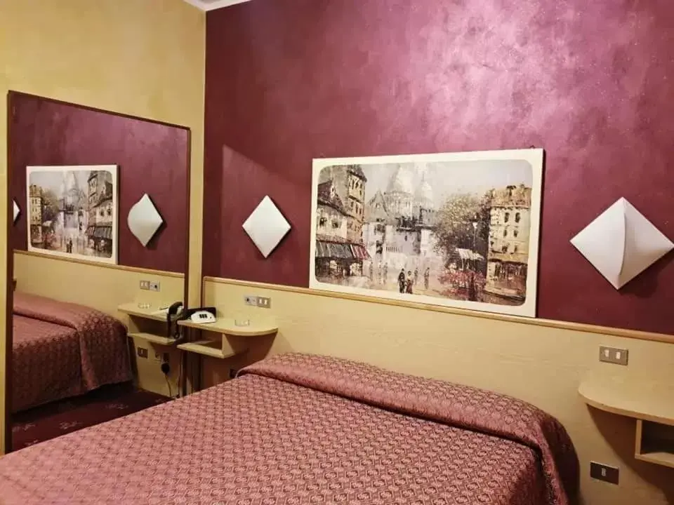 Bed in HOTEL PARADISO