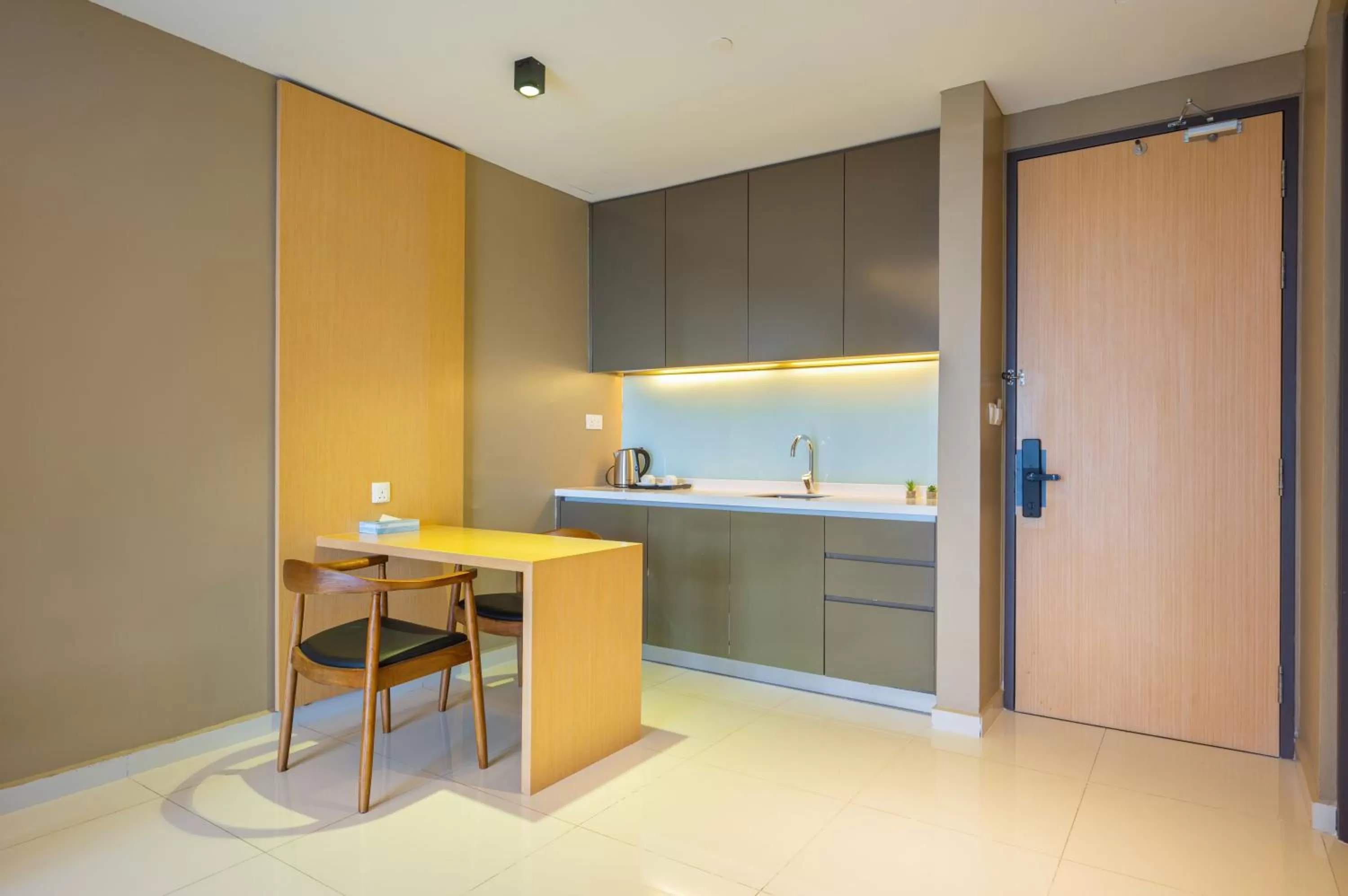 Seating area in Greystone 99 Suites