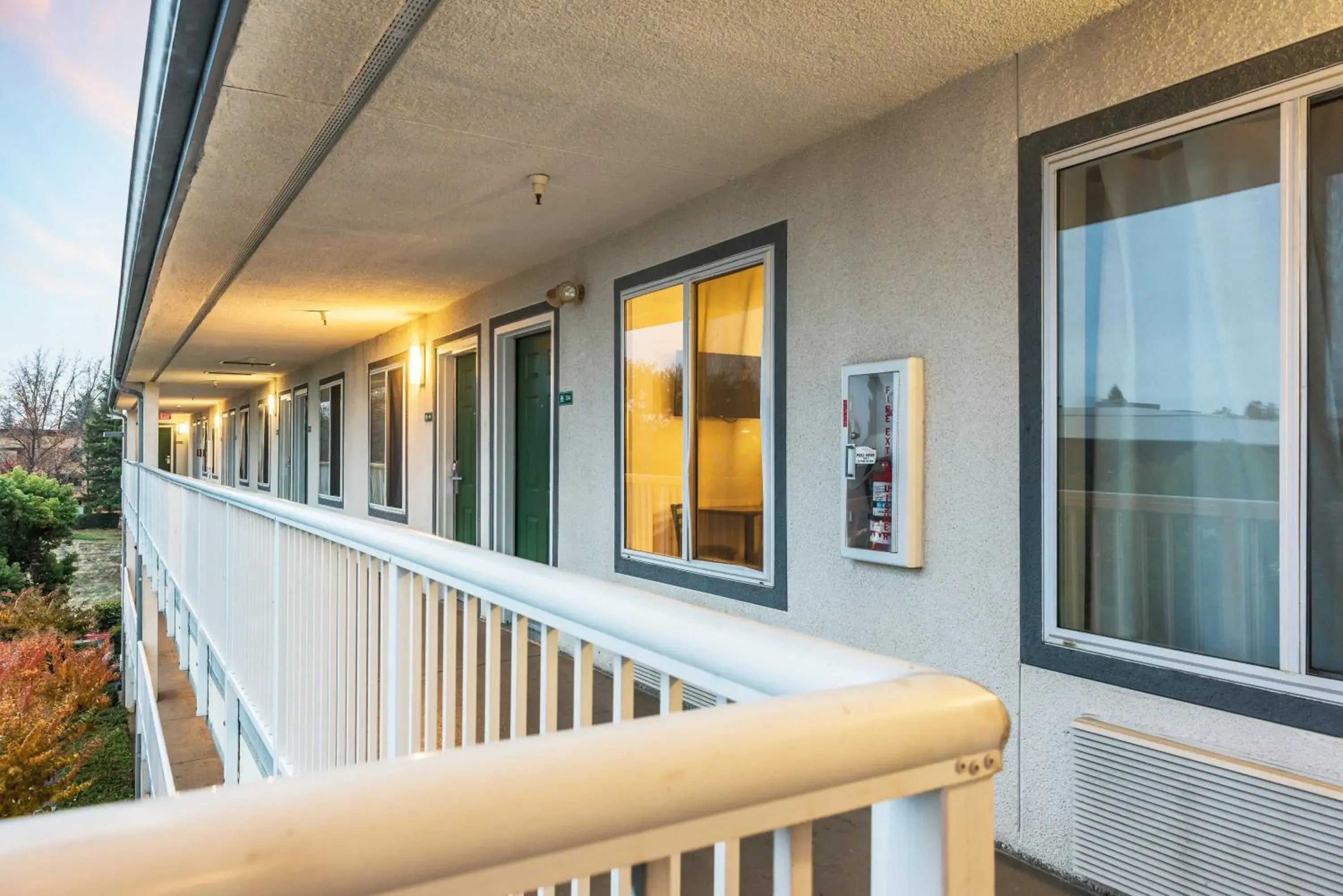 Property building, Balcony/Terrace in HomeTowne Studios by Red Roof Rancho Cordova