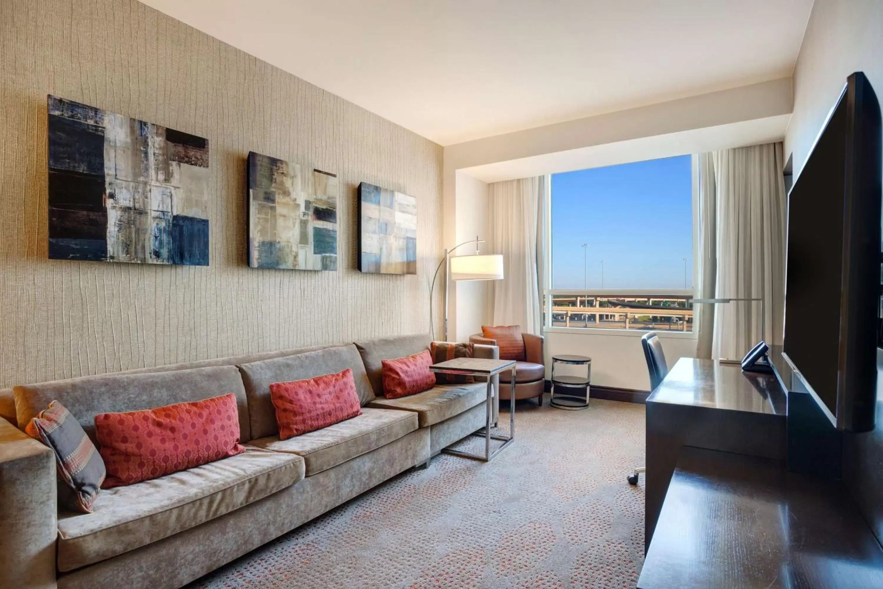 Living room, Seating Area in Hilton Dallas/Plano Granite Park