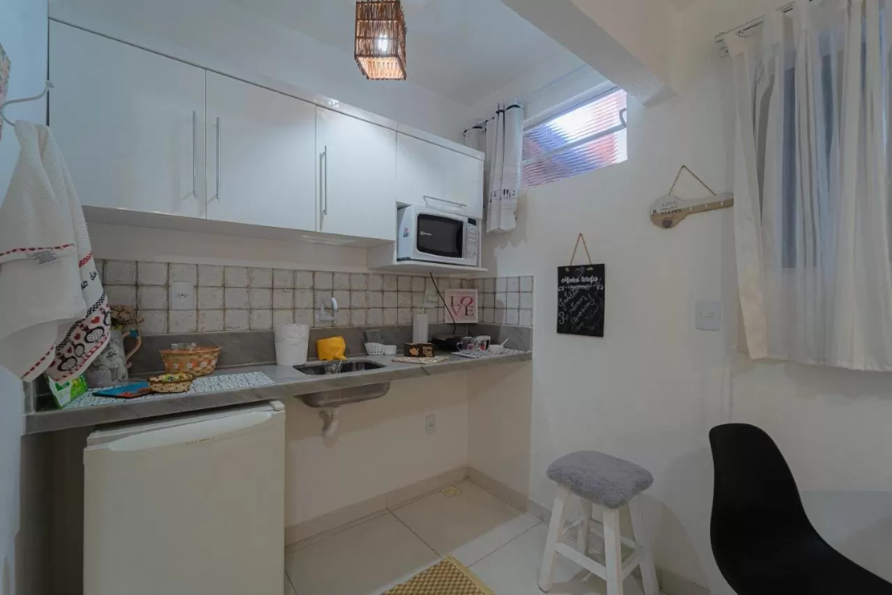 Kitchen or kitchenette, Kitchen/Kitchenette in Pousada Recanto da Família
