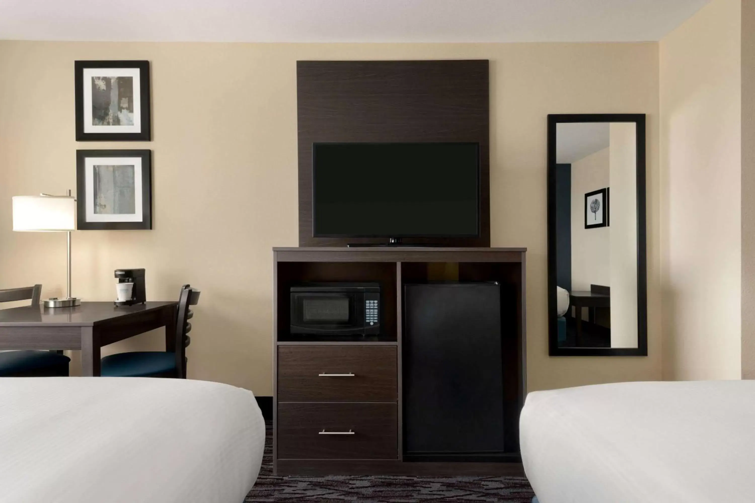 Photo of the whole room, TV/Entertainment Center in AmericInn by Wyndham Dodgeville