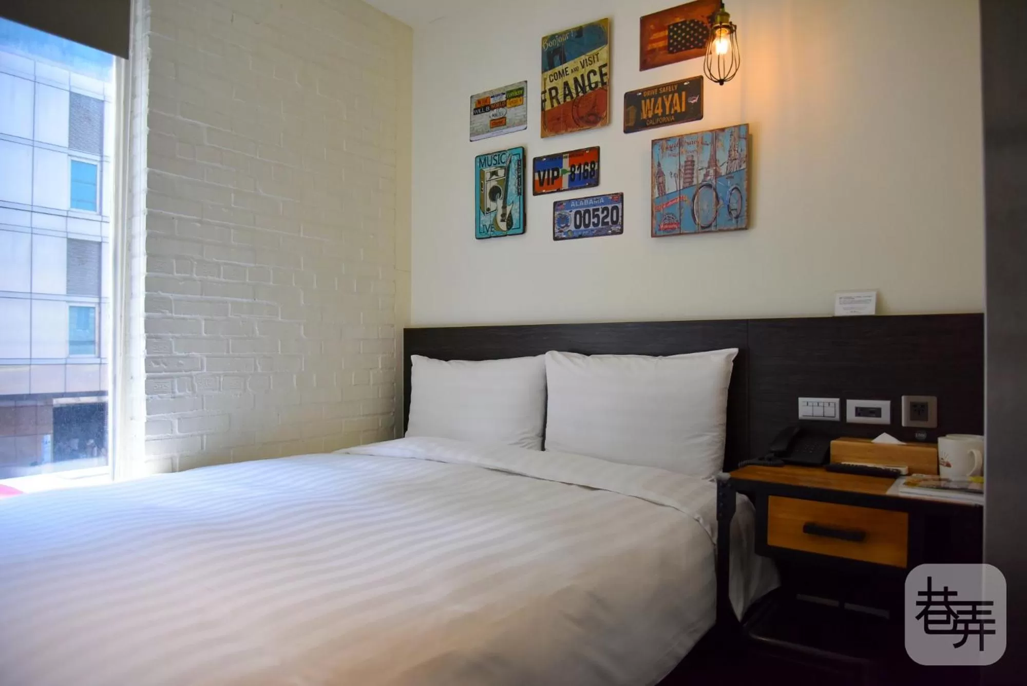 Bed in Re-Change Hotel Taipei