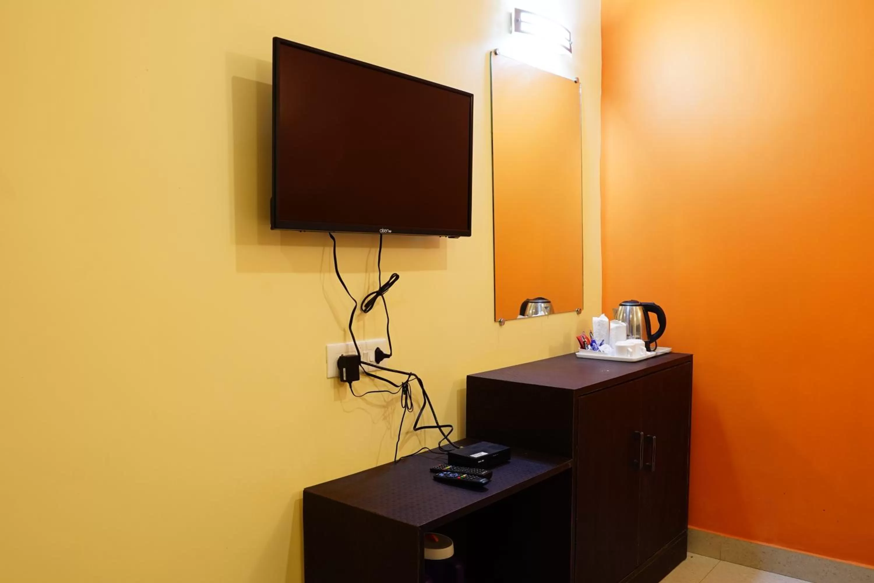 TV and multimedia, TV/Entertainment Center in Hotel White Lotus Gangtok