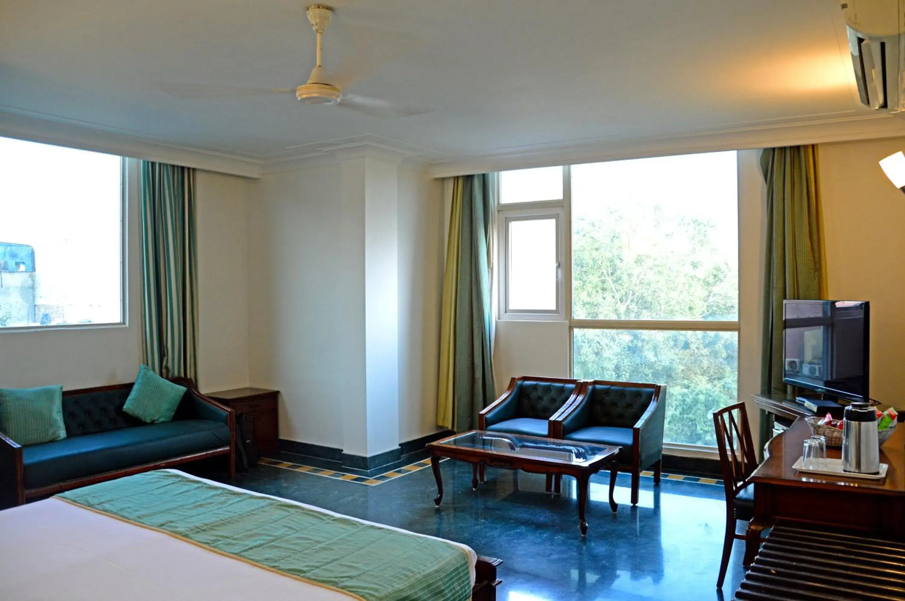 Bedroom, Seating Area in Hotel Ajanta