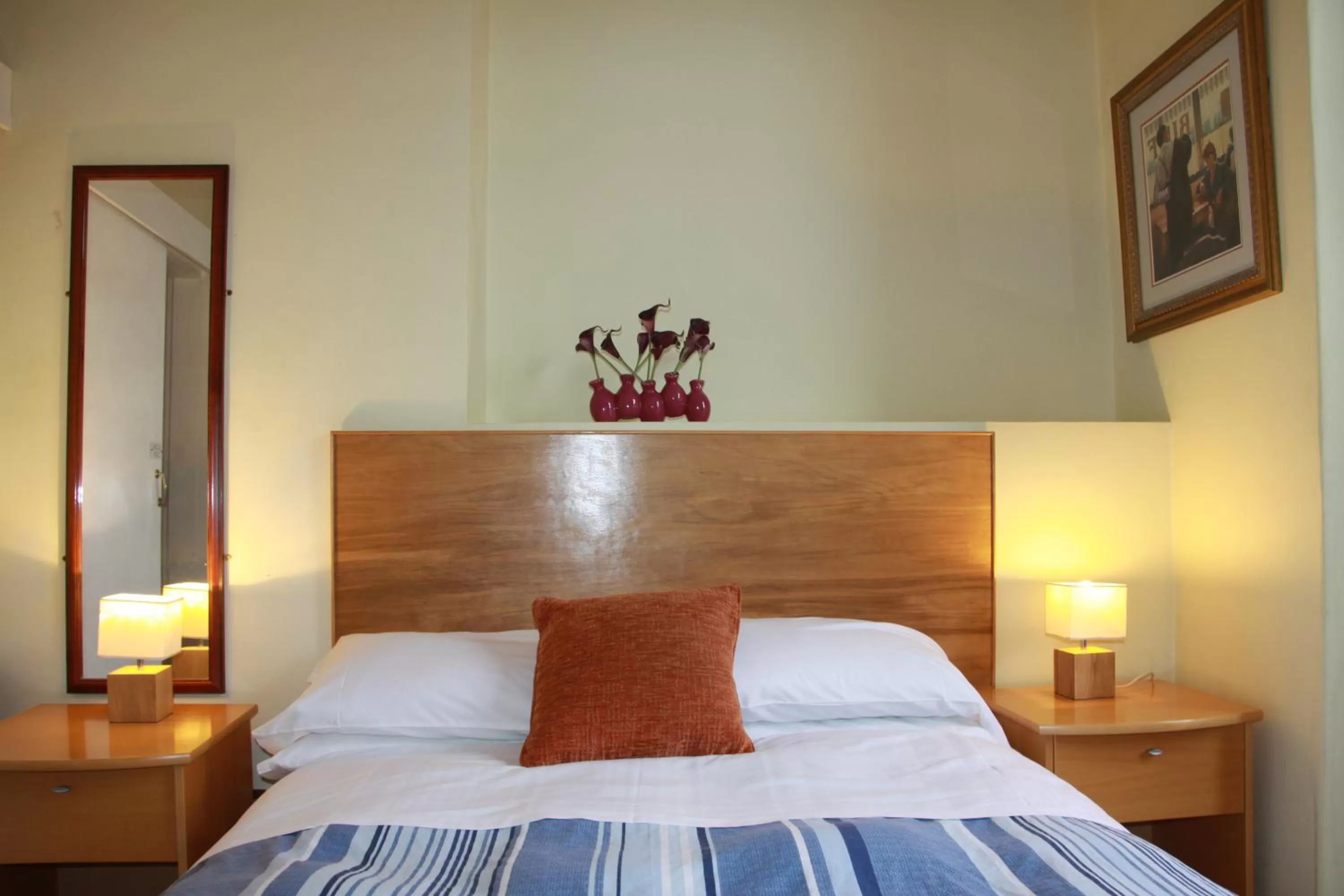 Bed in Ambassador Hotel