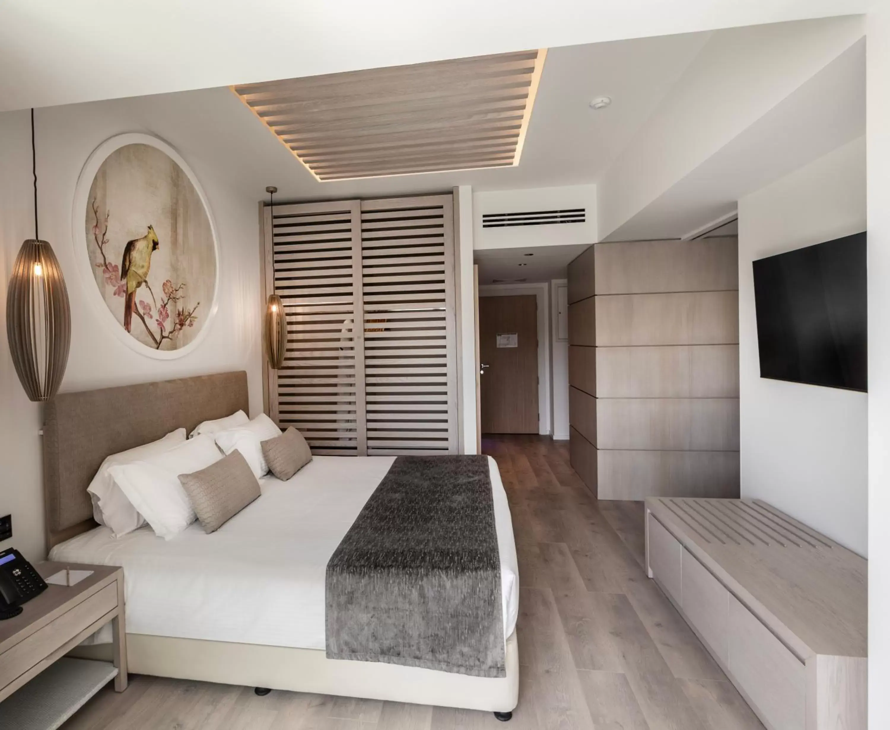 Bed in NissiBlu Beach Resort Bed in NissiBlu Beach Resort