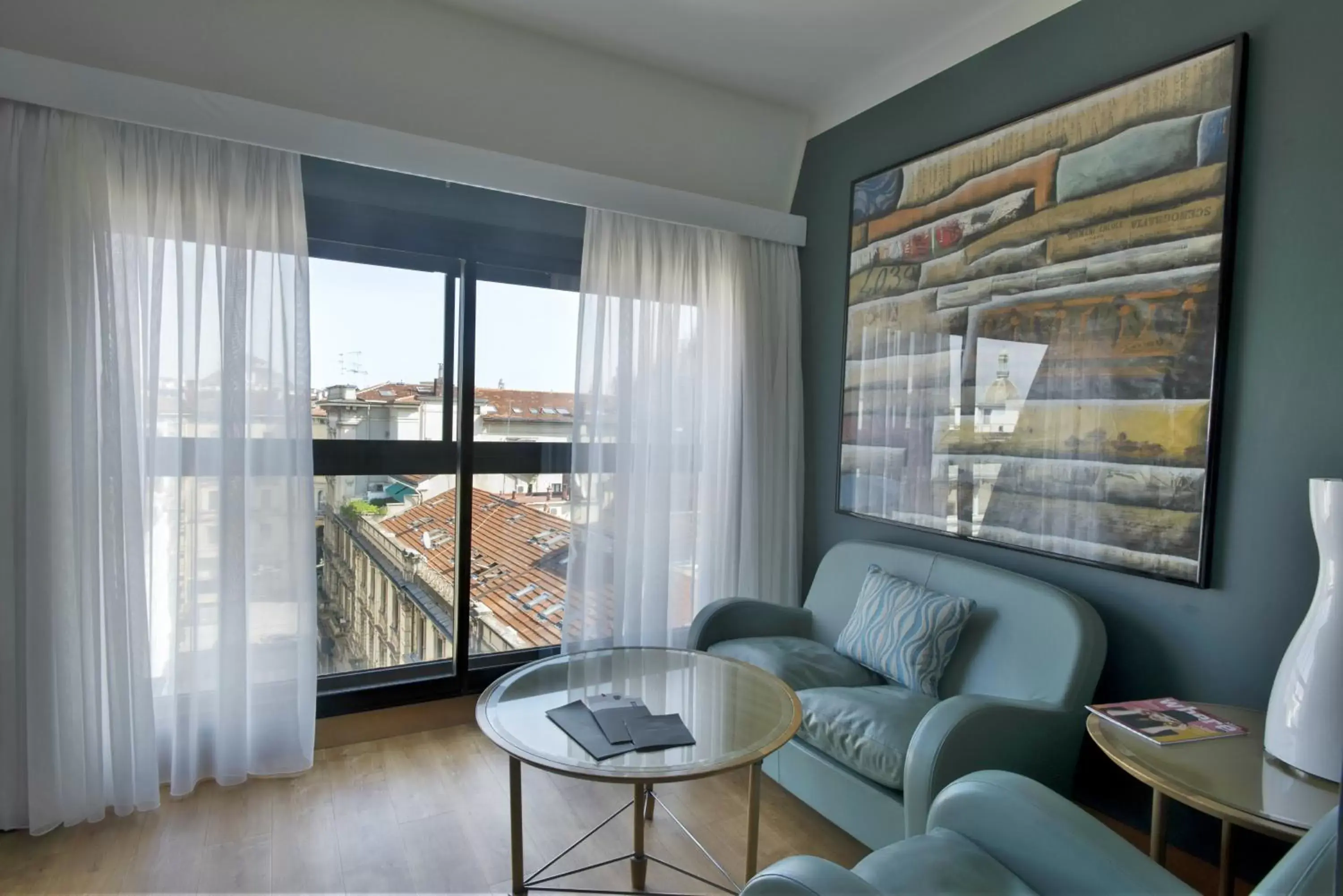 Photo of the whole room, Seating Area in Hotel Spadari Al Duomo