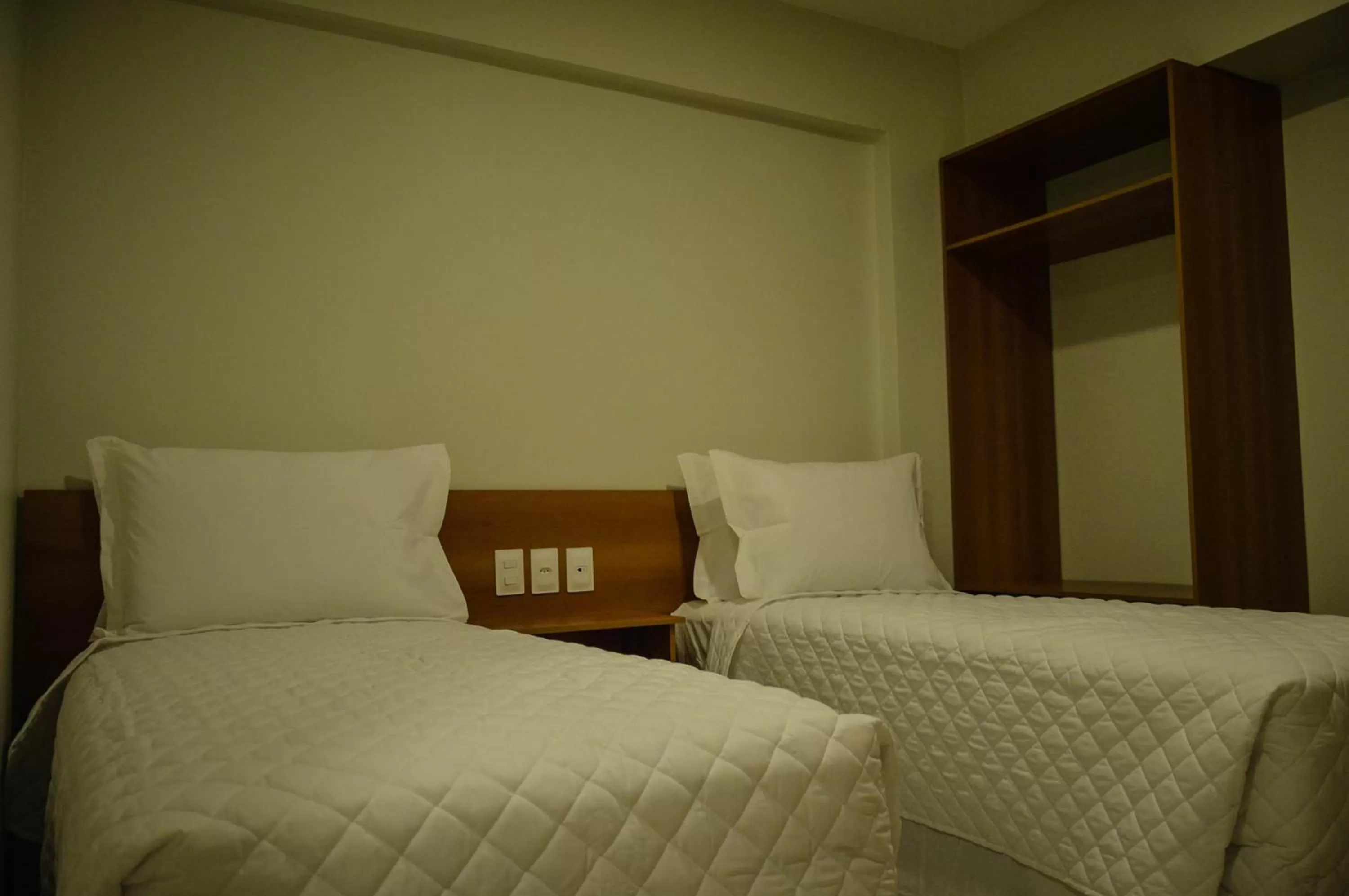 Bed in Aquarena Hotel