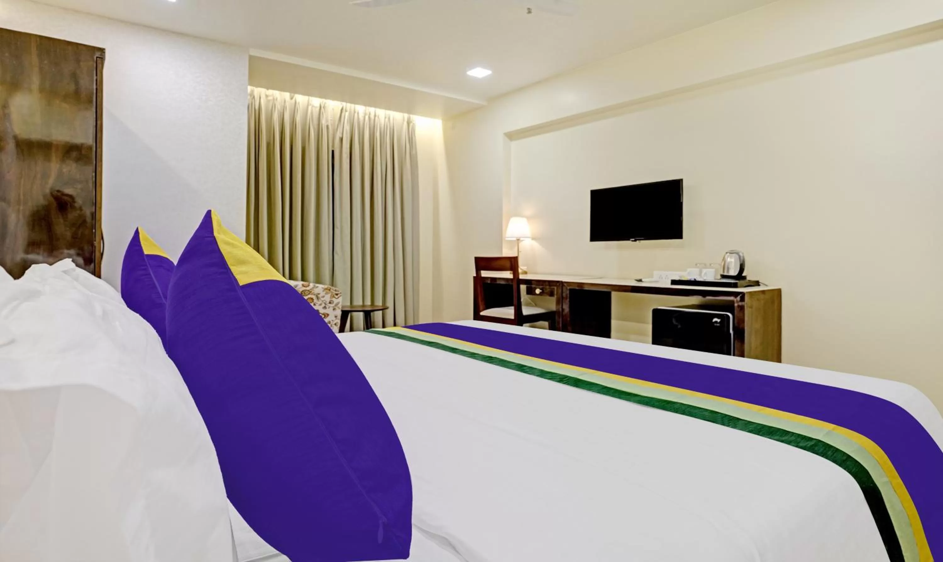 Bedroom, Bed in Treebo Premium Golden Bliss Trimurti Nagar Square