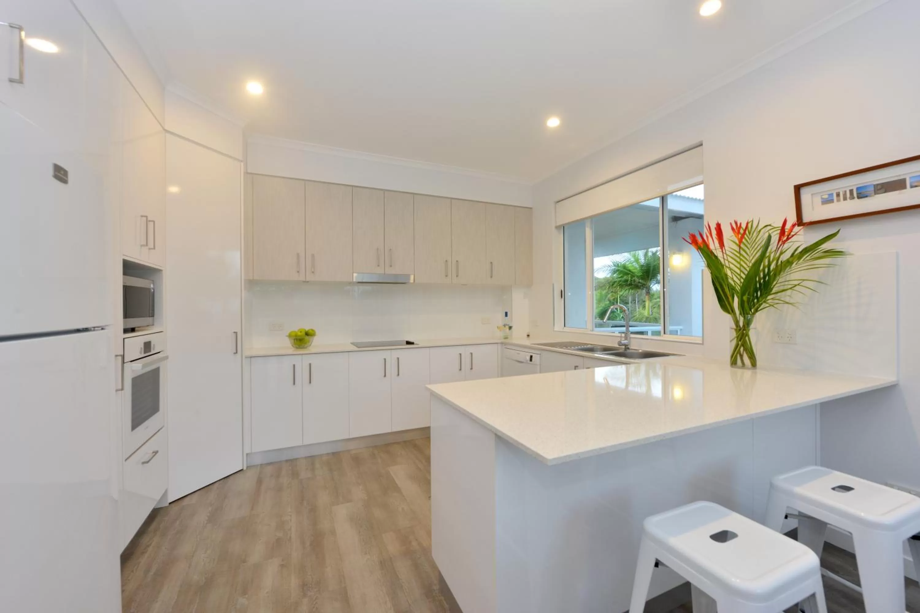 kitchen in Beaches Holiday Apartments - Official Onsite Reception & Check In