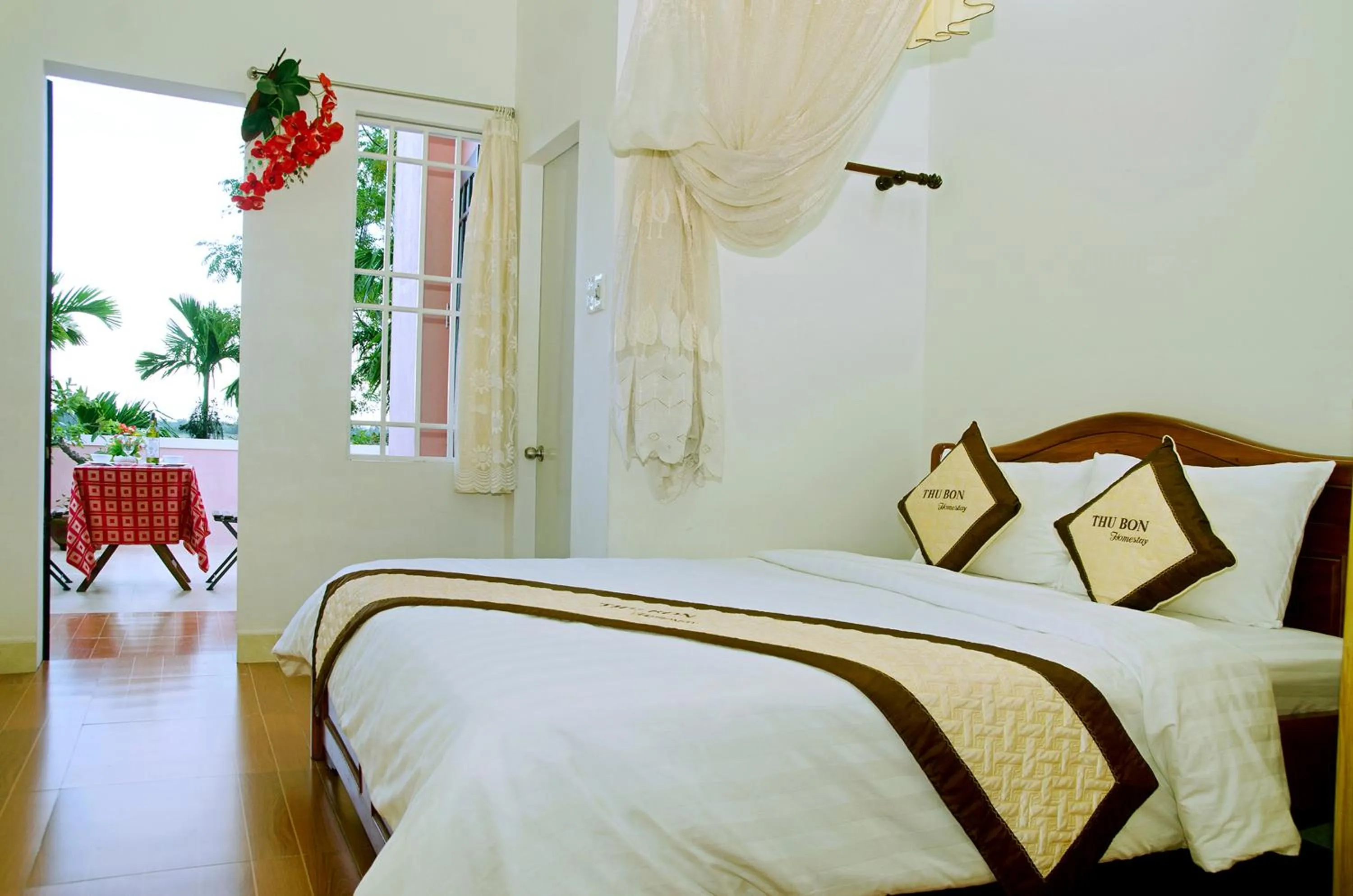 Photo of the whole room, Bed in Thu Bon Riverside Homestay