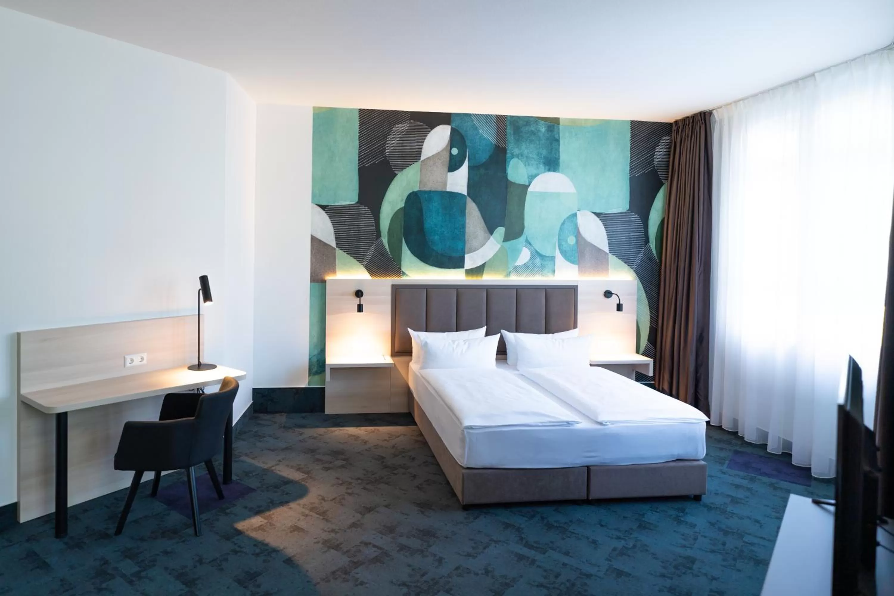 Photo of the whole room, Bed in Taste Hotel Kulmbach