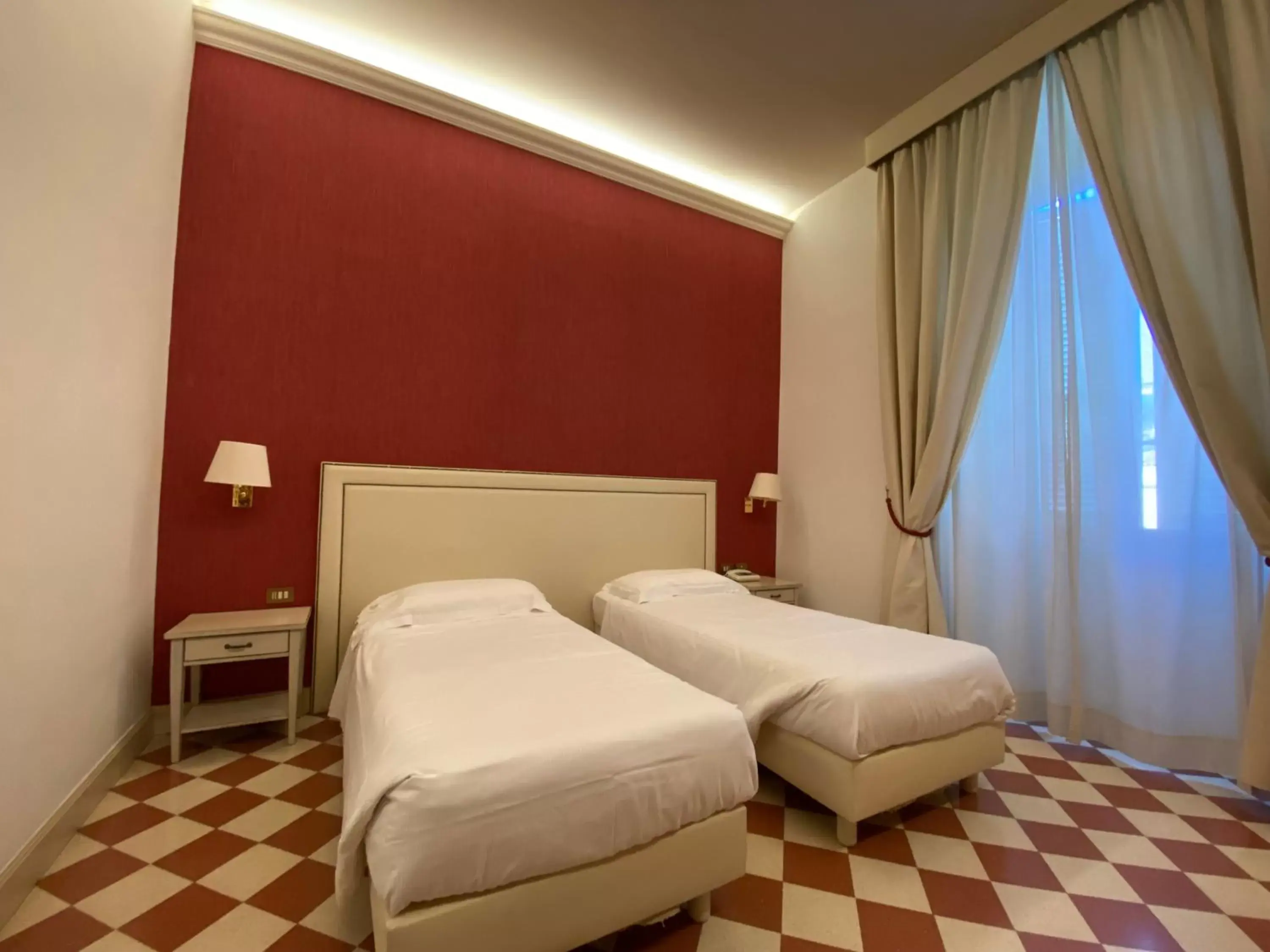 Bed in Basilica Hotel