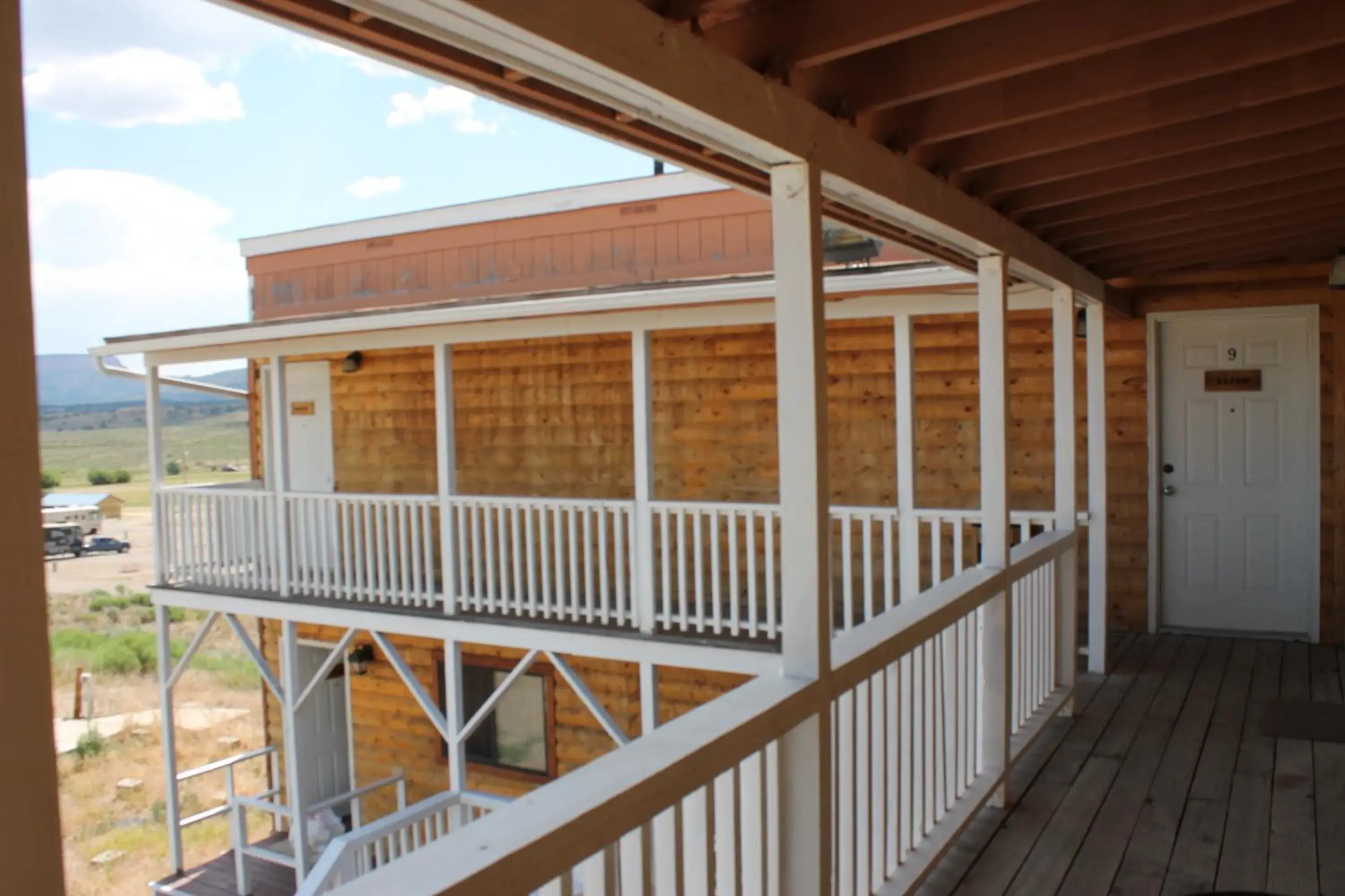 Property building, Balcony/Terrace in The Riverside Ranch Motel and RV Park