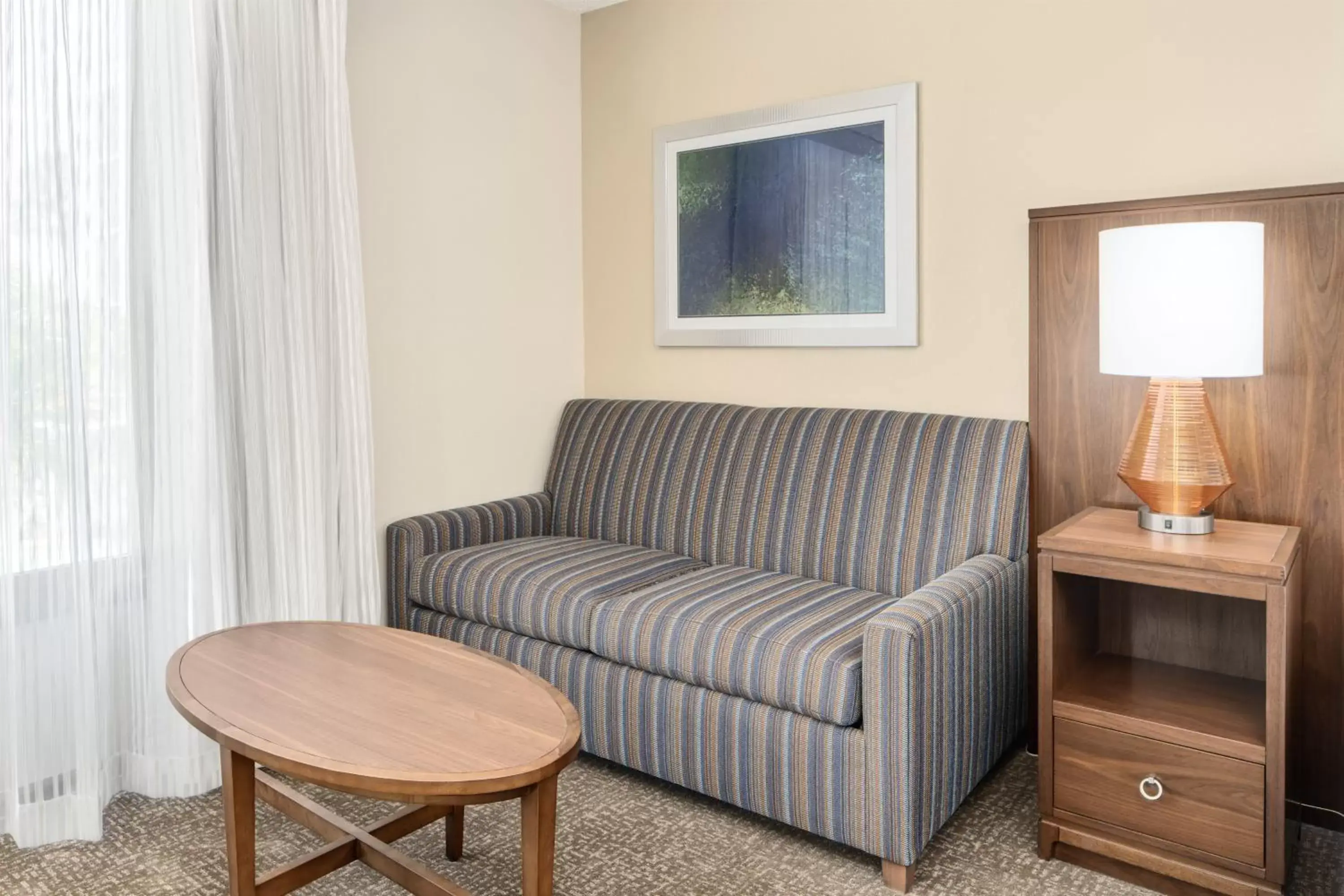 Photo of the whole room, Seating Area in Crowne Plaza Hotel Fort Myers at Bell Tower Shops, an IHG Hotel