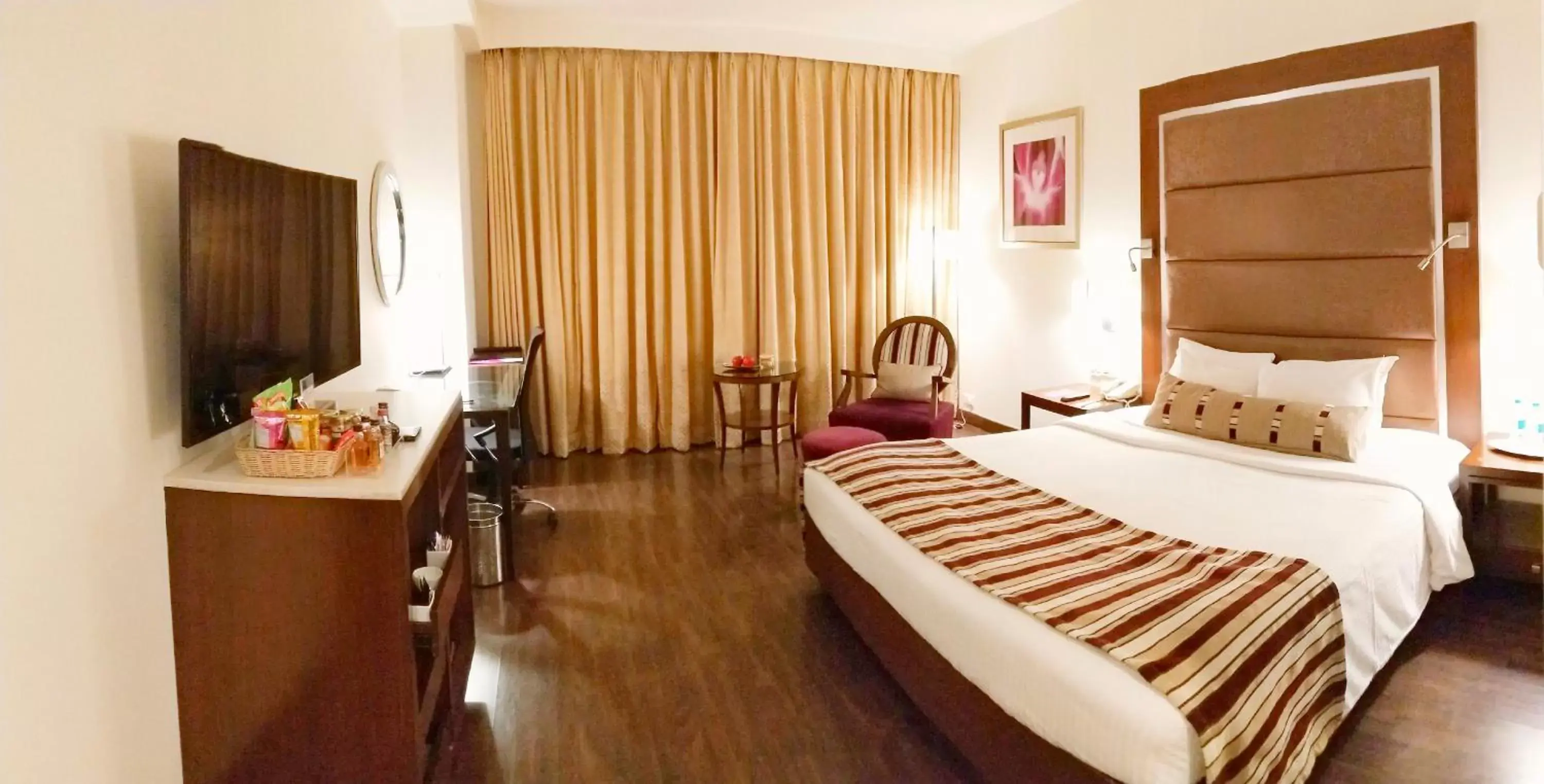 Photo of the whole room in Royal Orchid Central, Pune