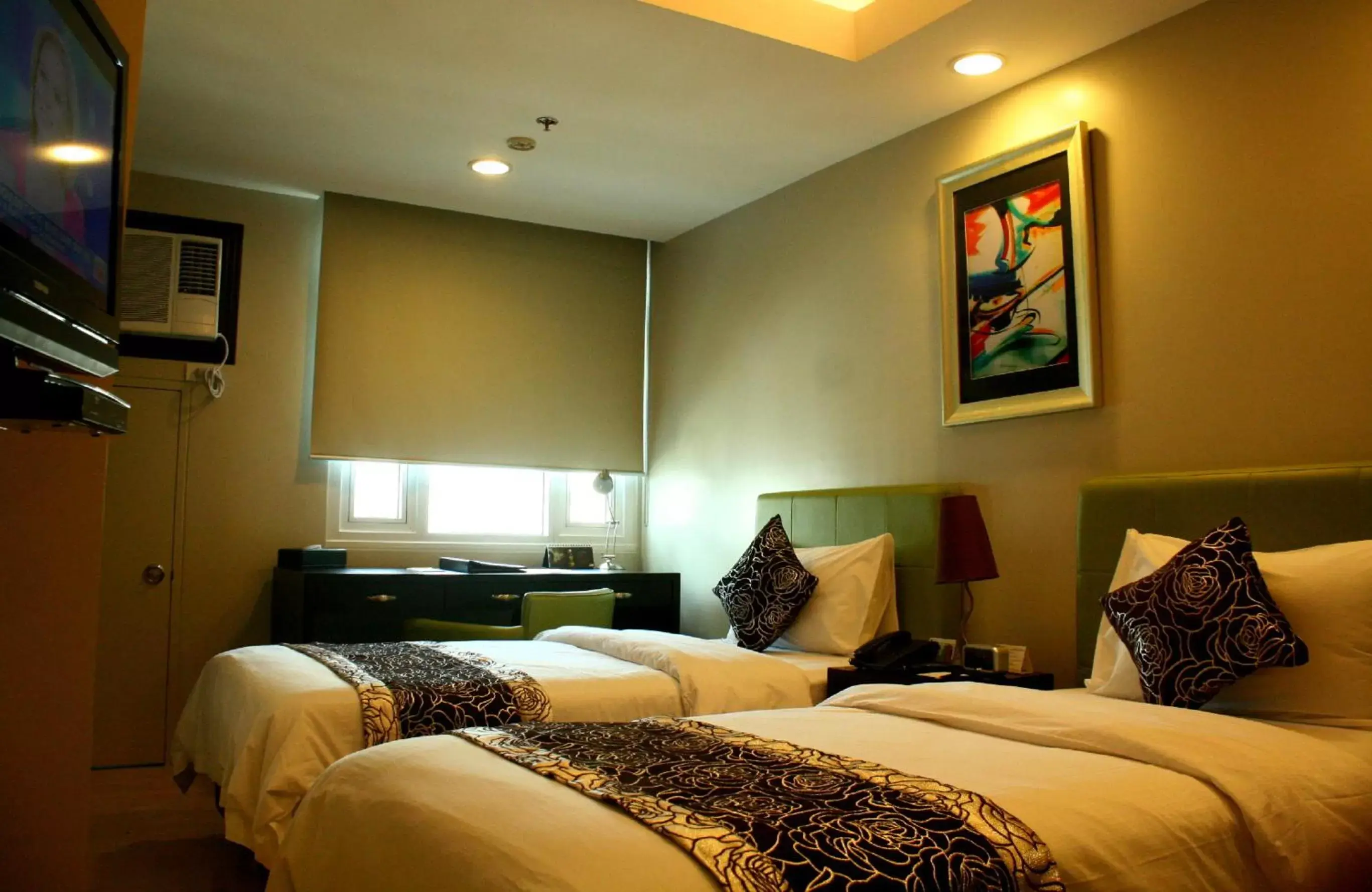 Bed in The Exchange Regency Residence Hotel Managed by HII