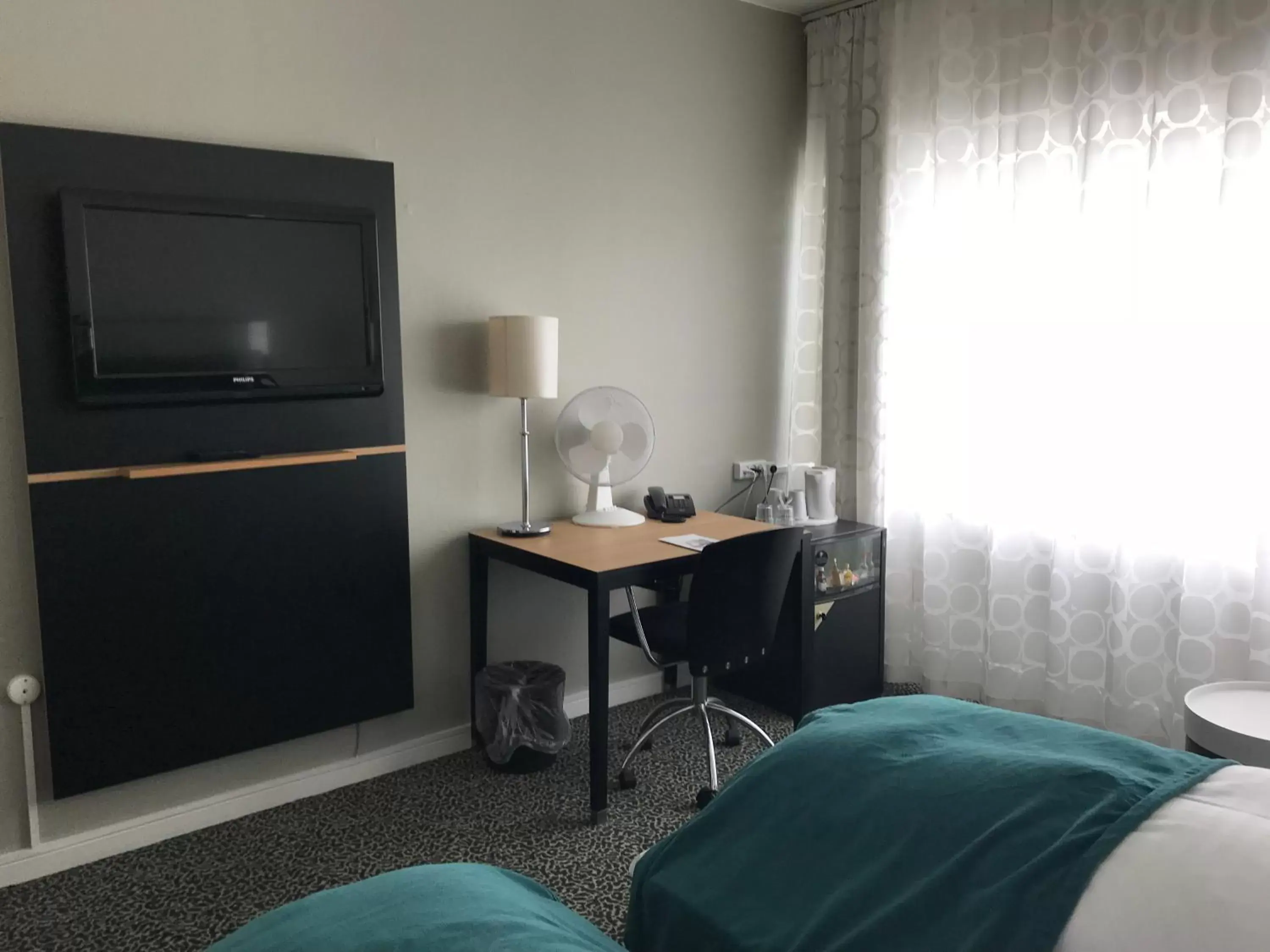 Bed, TV/Entertainment Center in Glostrup Park Hotel