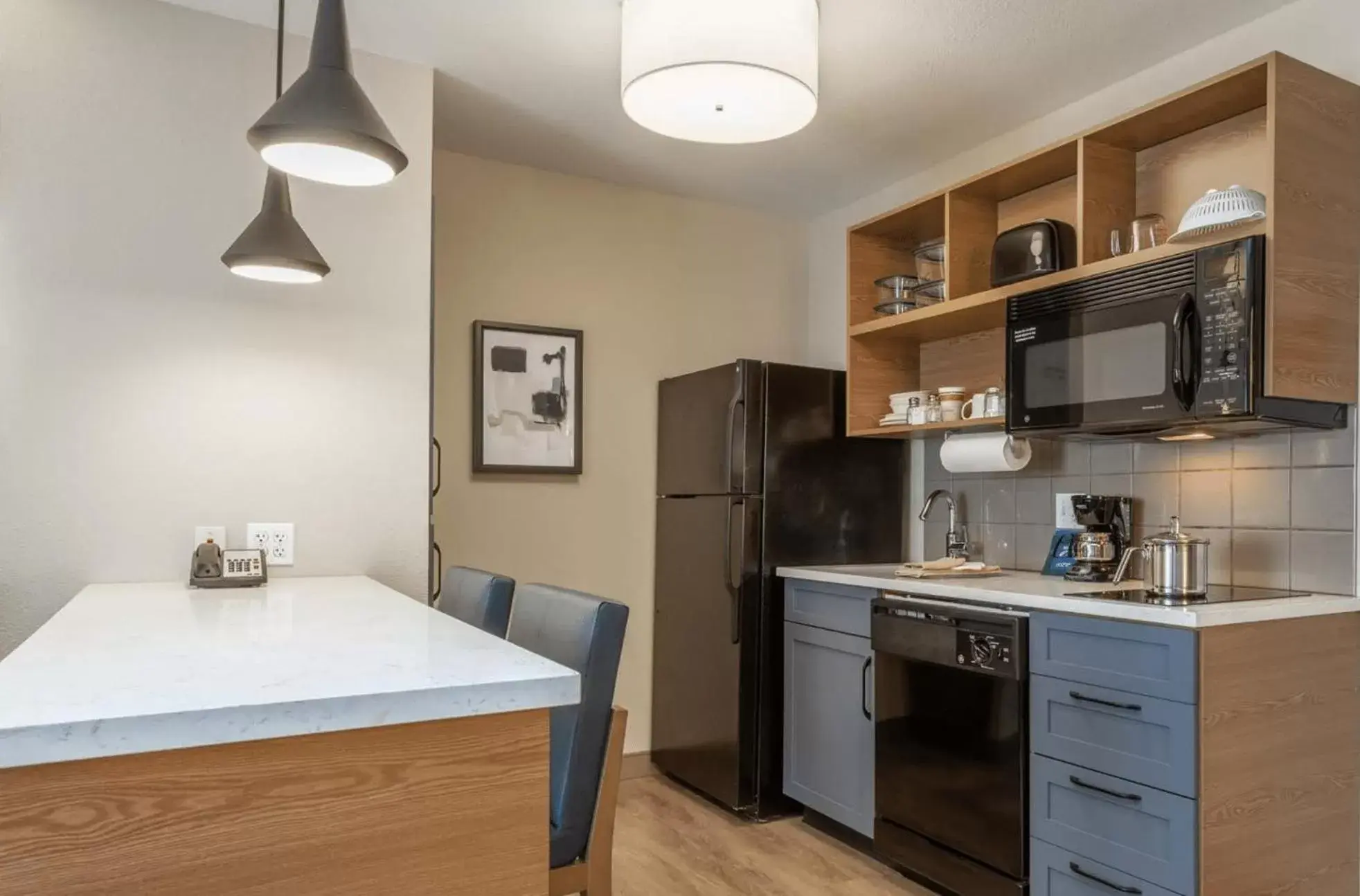 Kitchen or kitchenette, Kitchen/Kitchenette in Candlewood Suites Ofallon, Il - St. Louis Area, an IHG Hotel