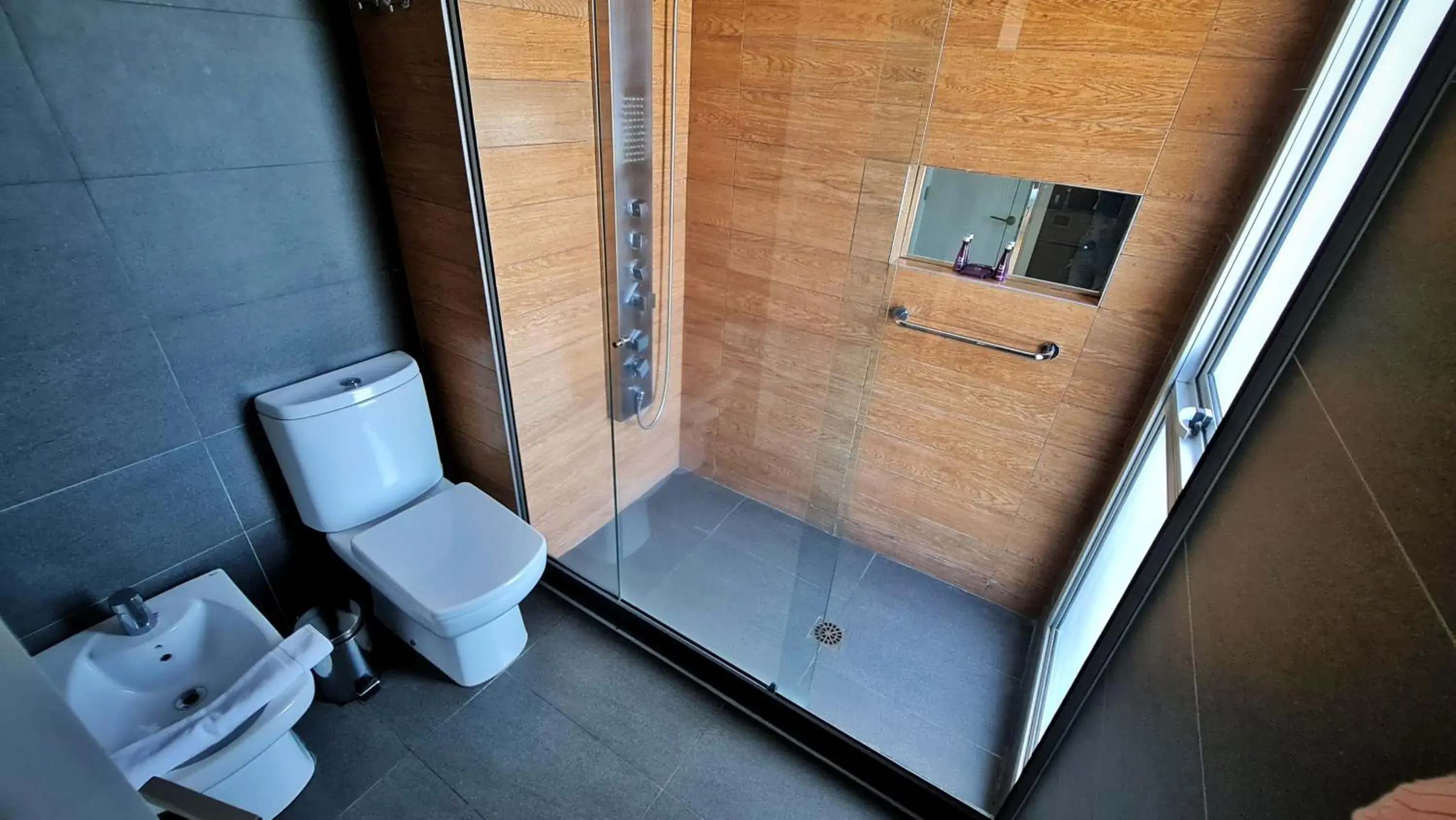 Shower, Bathroom in BIT Design Hotel