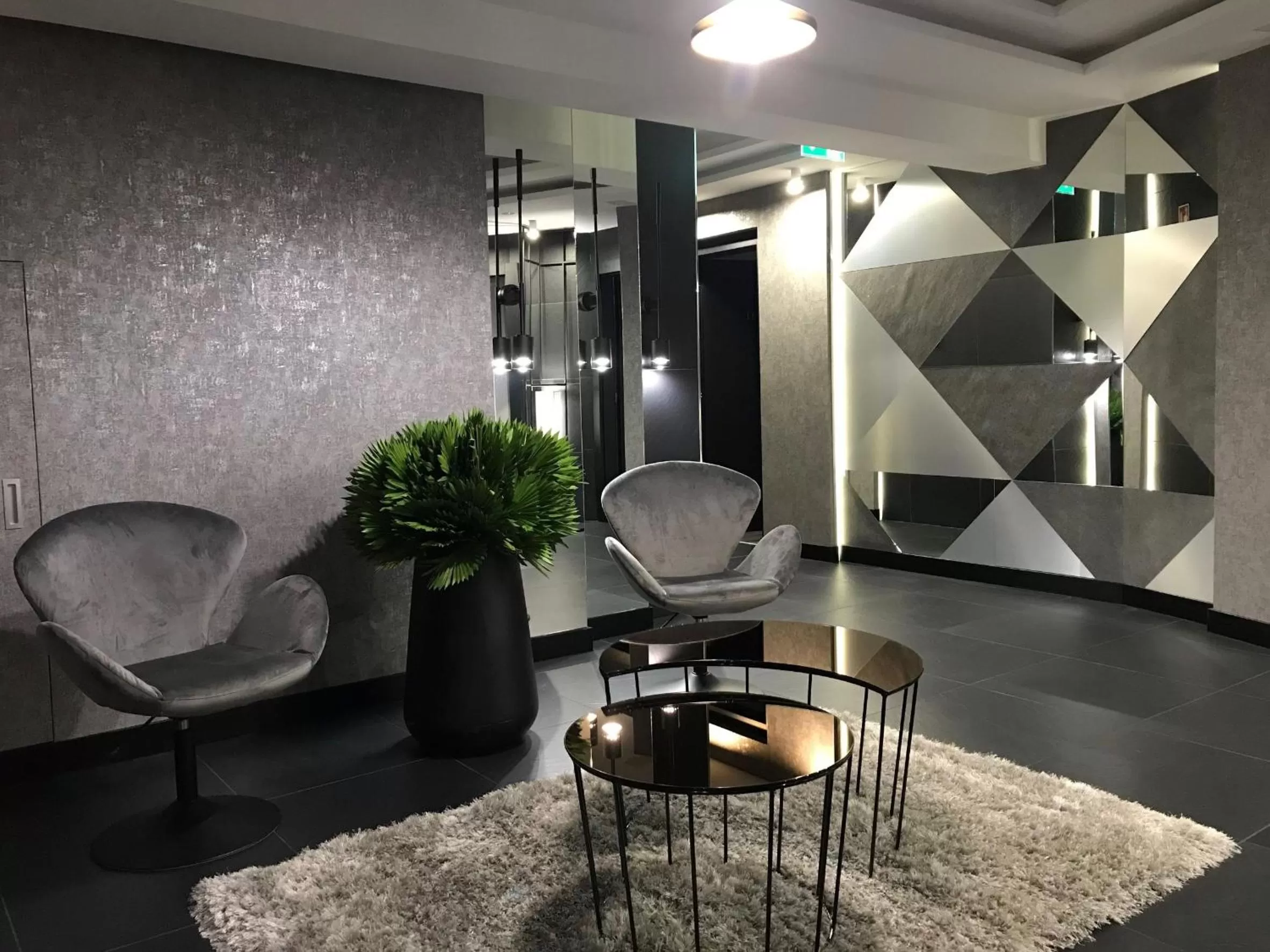 Communal lounge/ TV room, Seating Area in Hotel Central