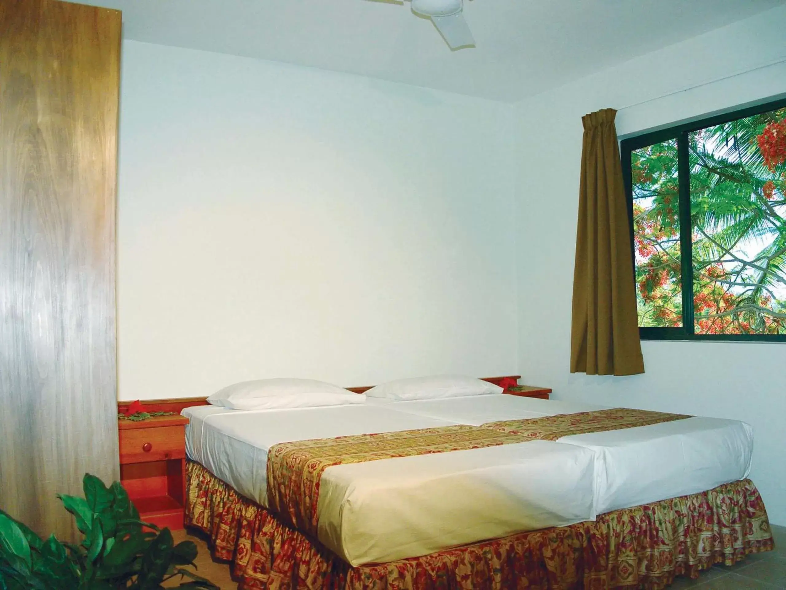 Bed in Hexagon International Hotel, Villas & Spa