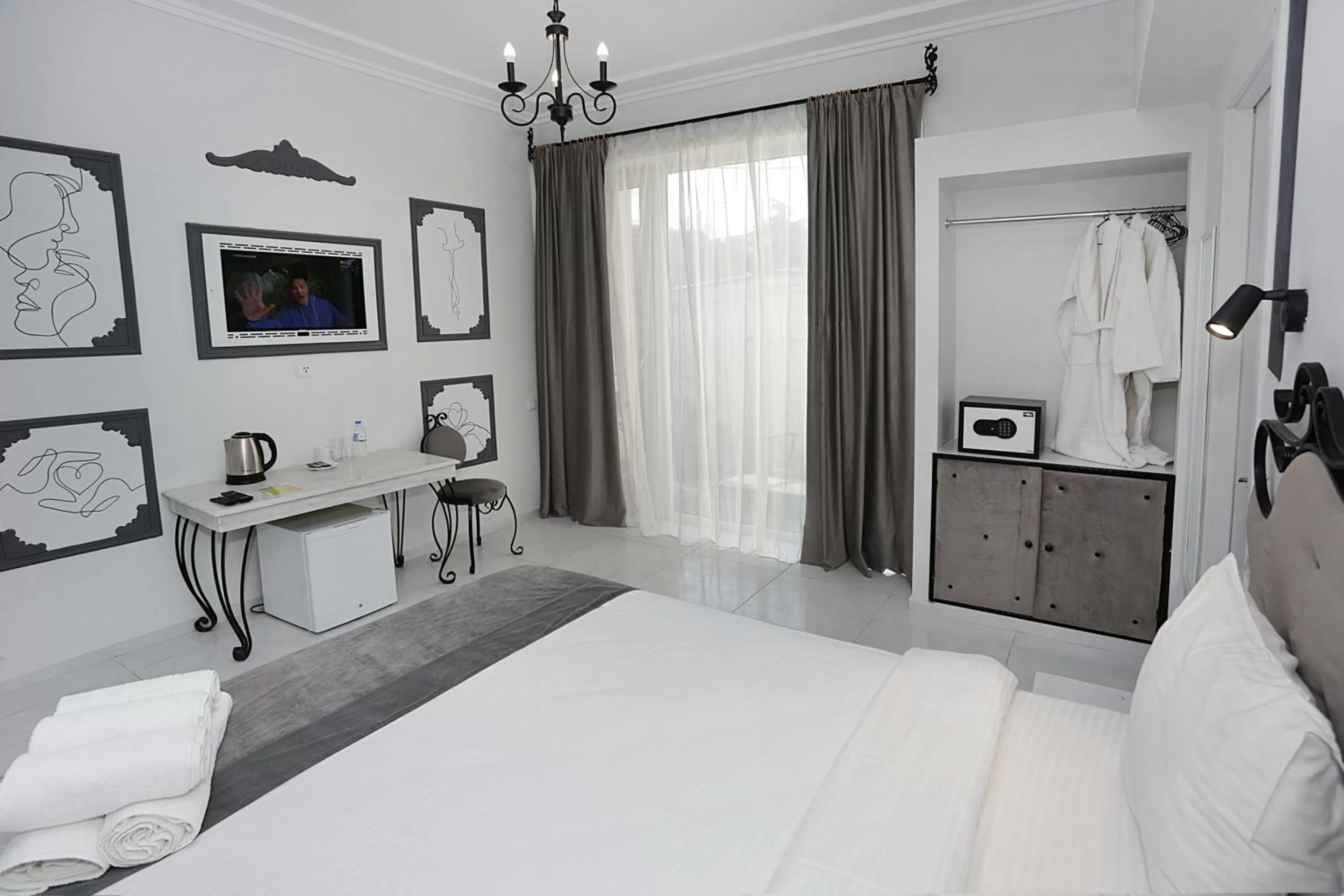 Photo of the whole room, Bed in The One Boutique