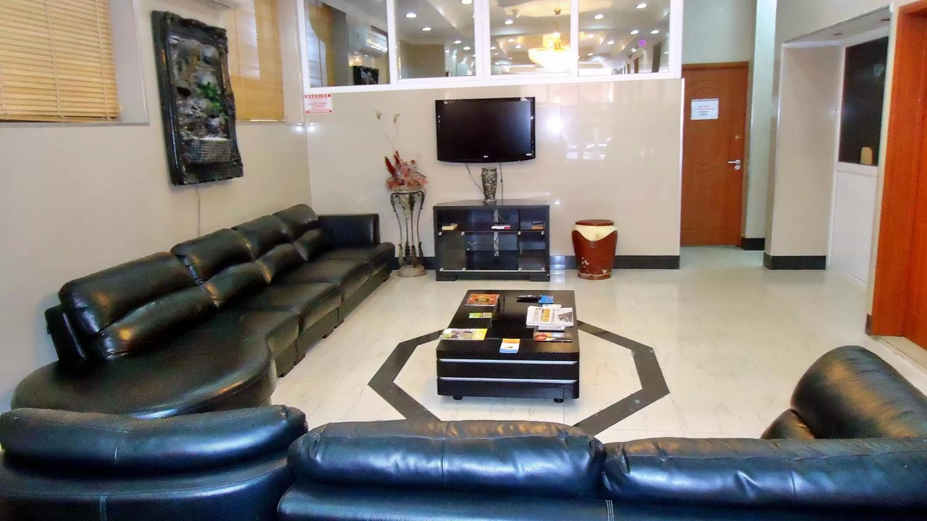 Communal lounge/ TV room in Rainbow Hotel