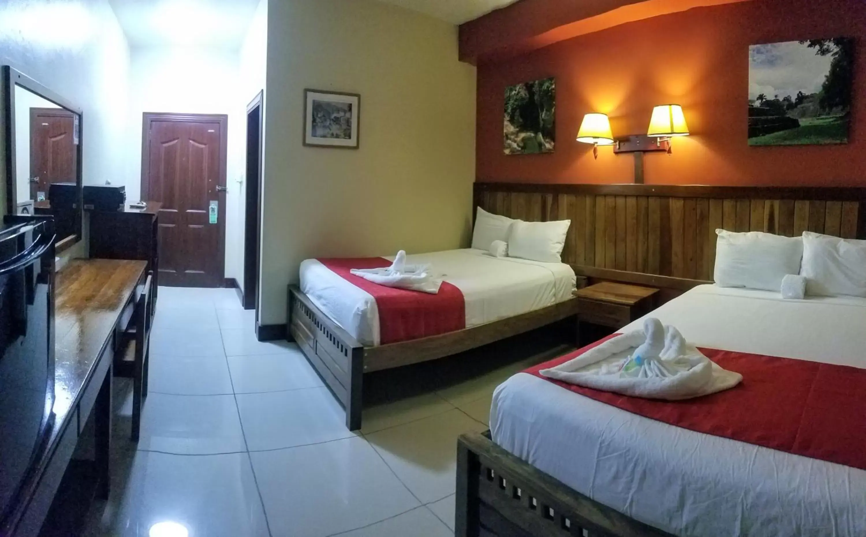 Photo of the whole room, Bed in Caye Caulker Plaza Hotel
