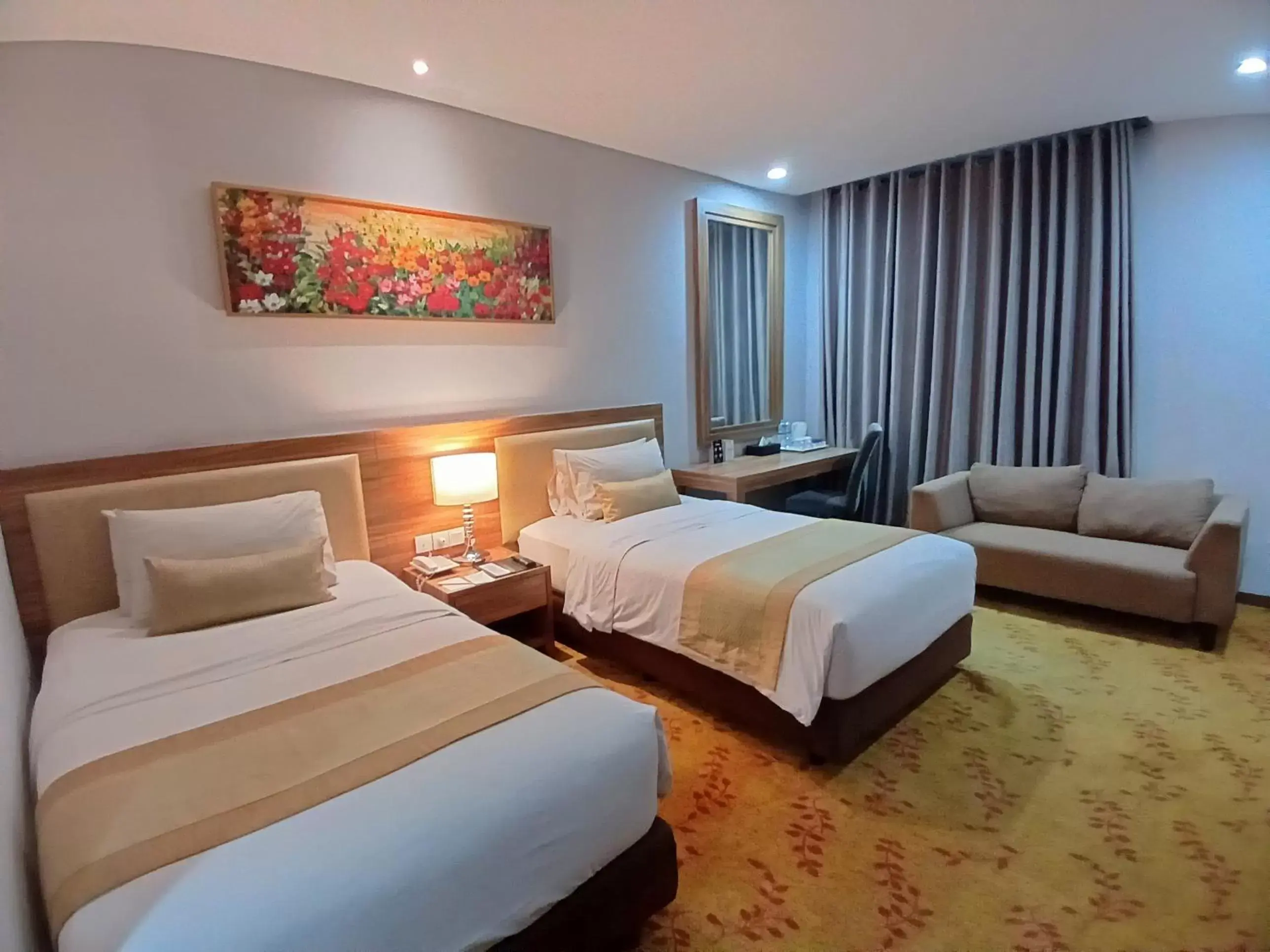 Bed in Grand Serela Yogyakarta by KAGUM Hotels