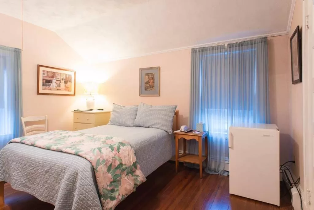 Bed in The Coolidge Corner Guest House: A Brookline Bed and Breakfast