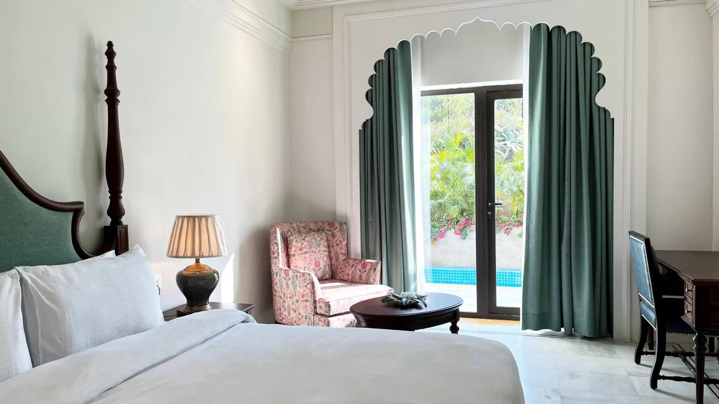 Pool view, Bed in Bhairavgarh Palace Udaipur