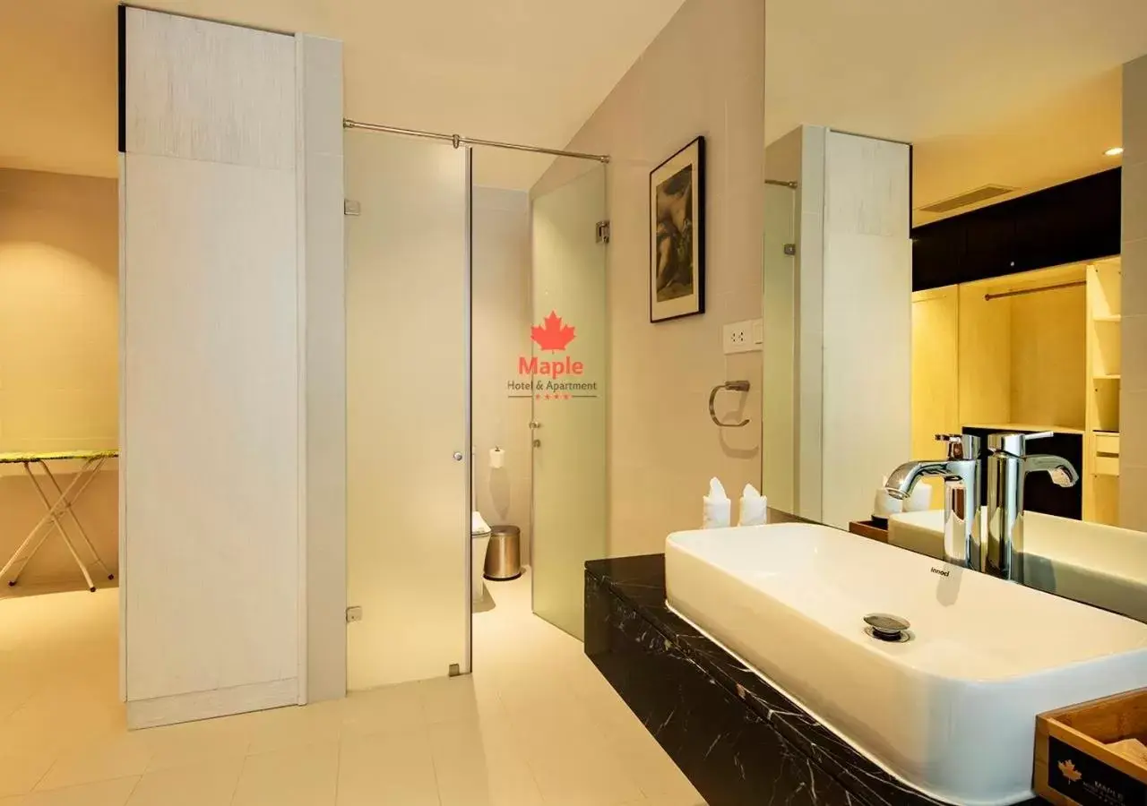 Bathroom in Maple Hotel & Apartment