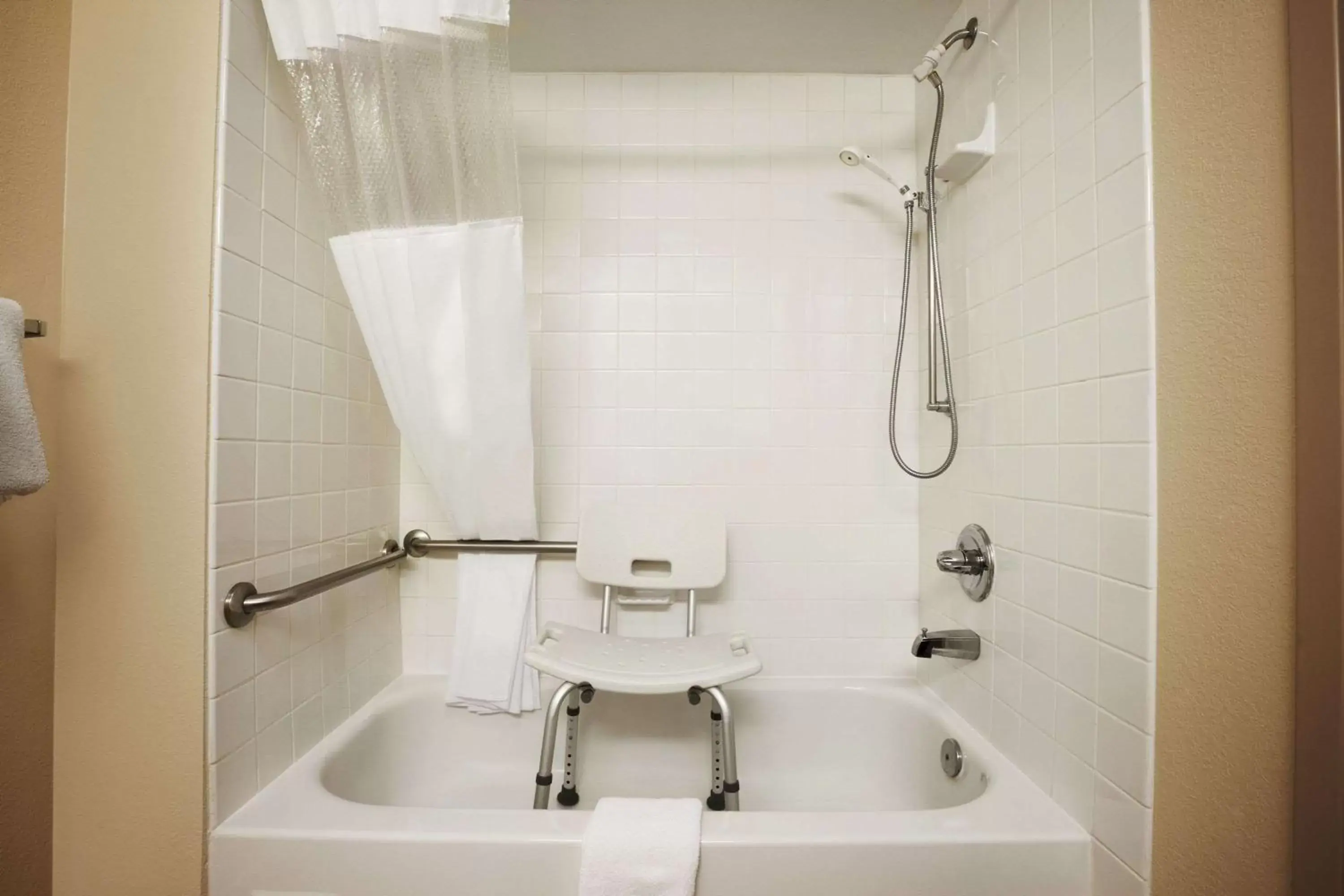 Bathroom in Days Inn & Suites by Wyndham Cedar Rapids