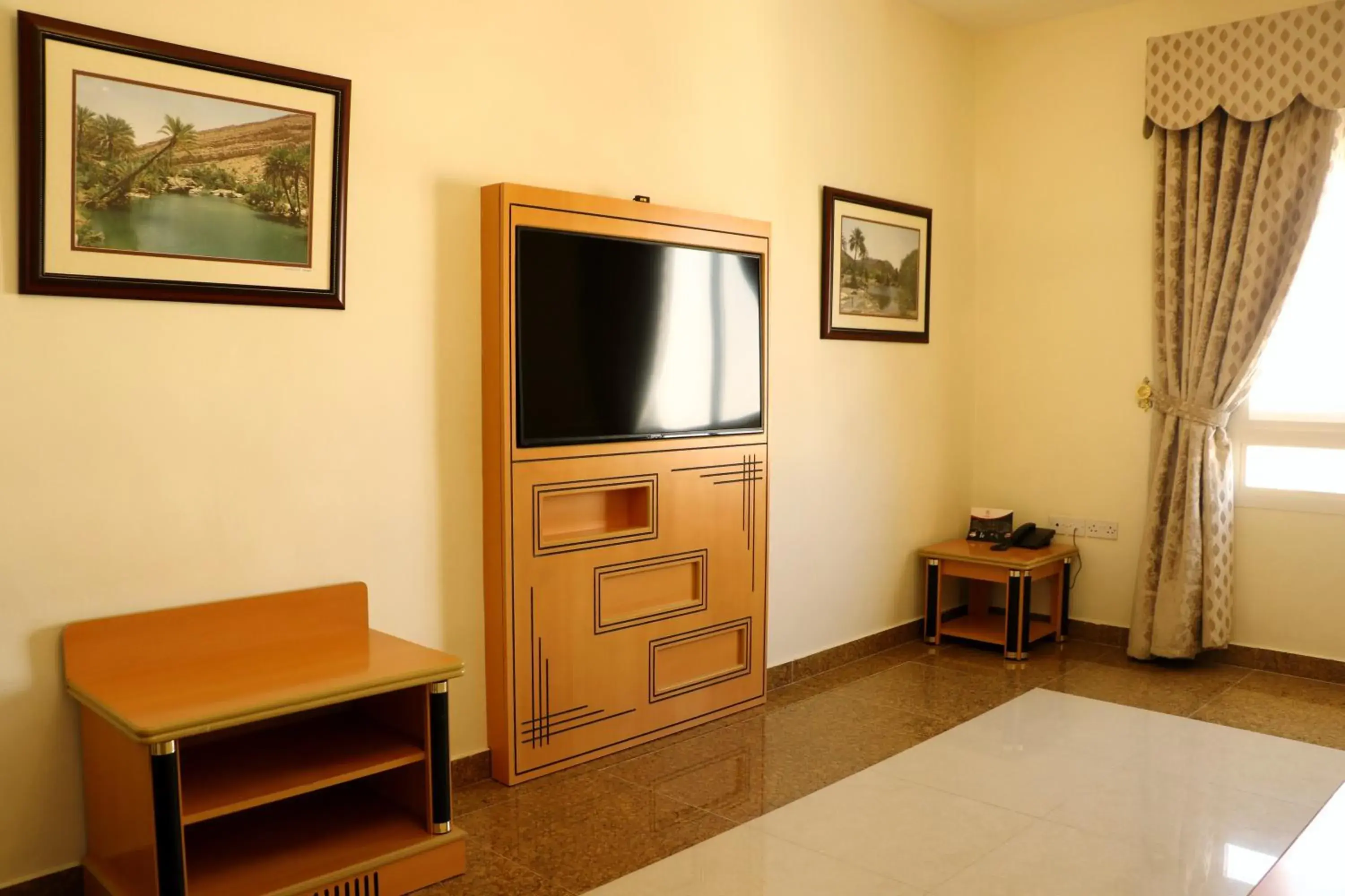 TV/Entertainment Center in Al Nile (3) Furnished Flats