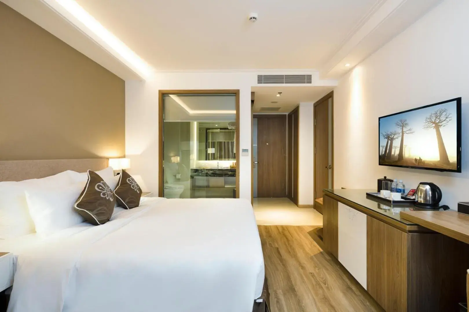 TV and multimedia, Bed in Asteria Comodo Nha Trang Hotel